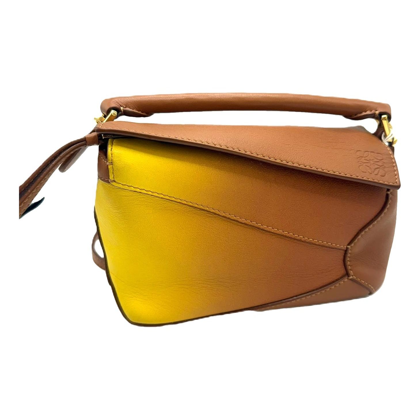 Puzzle leather handbag