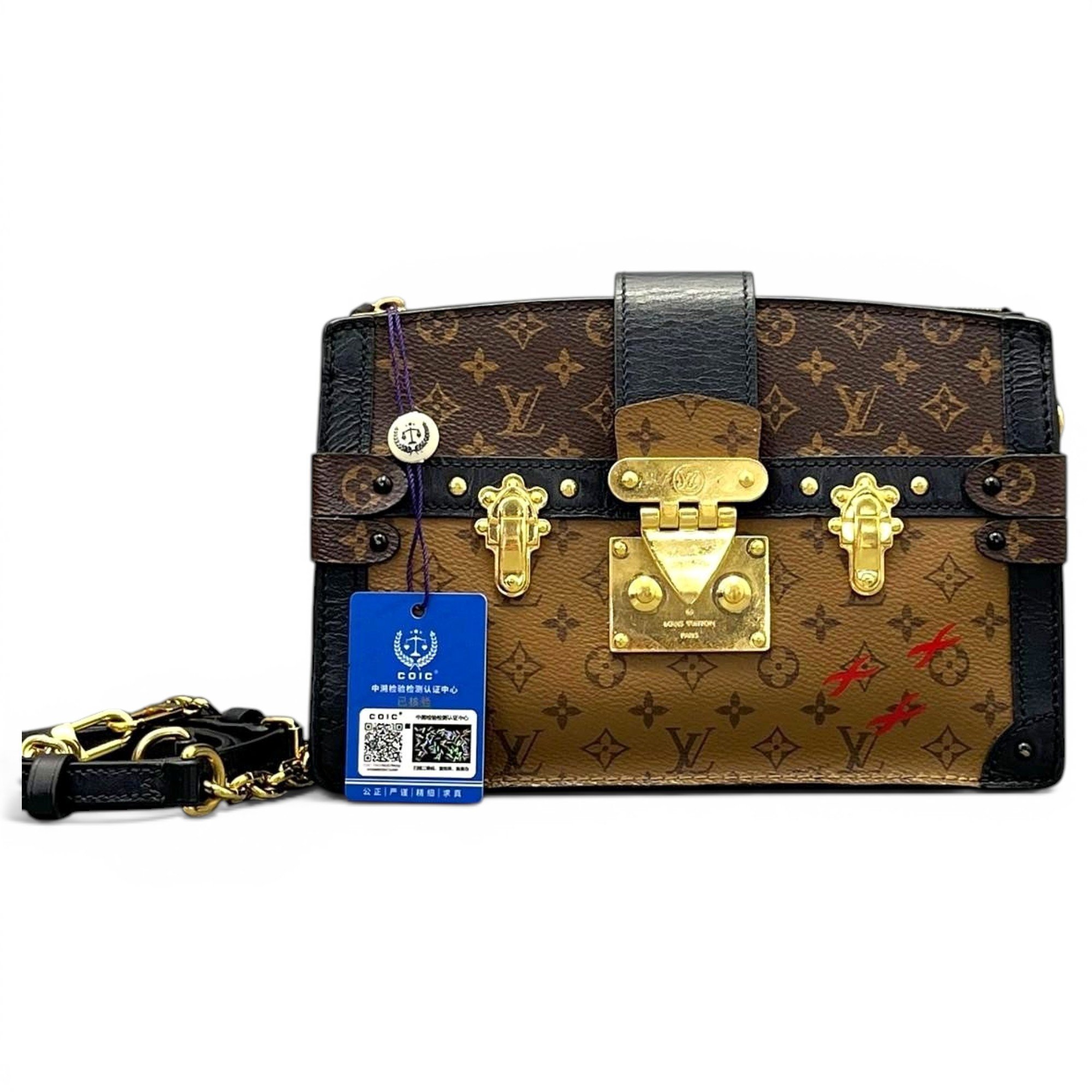 Pochette Trunk leather handbag