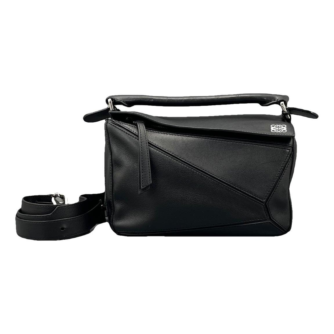 Puzzle leather handbag