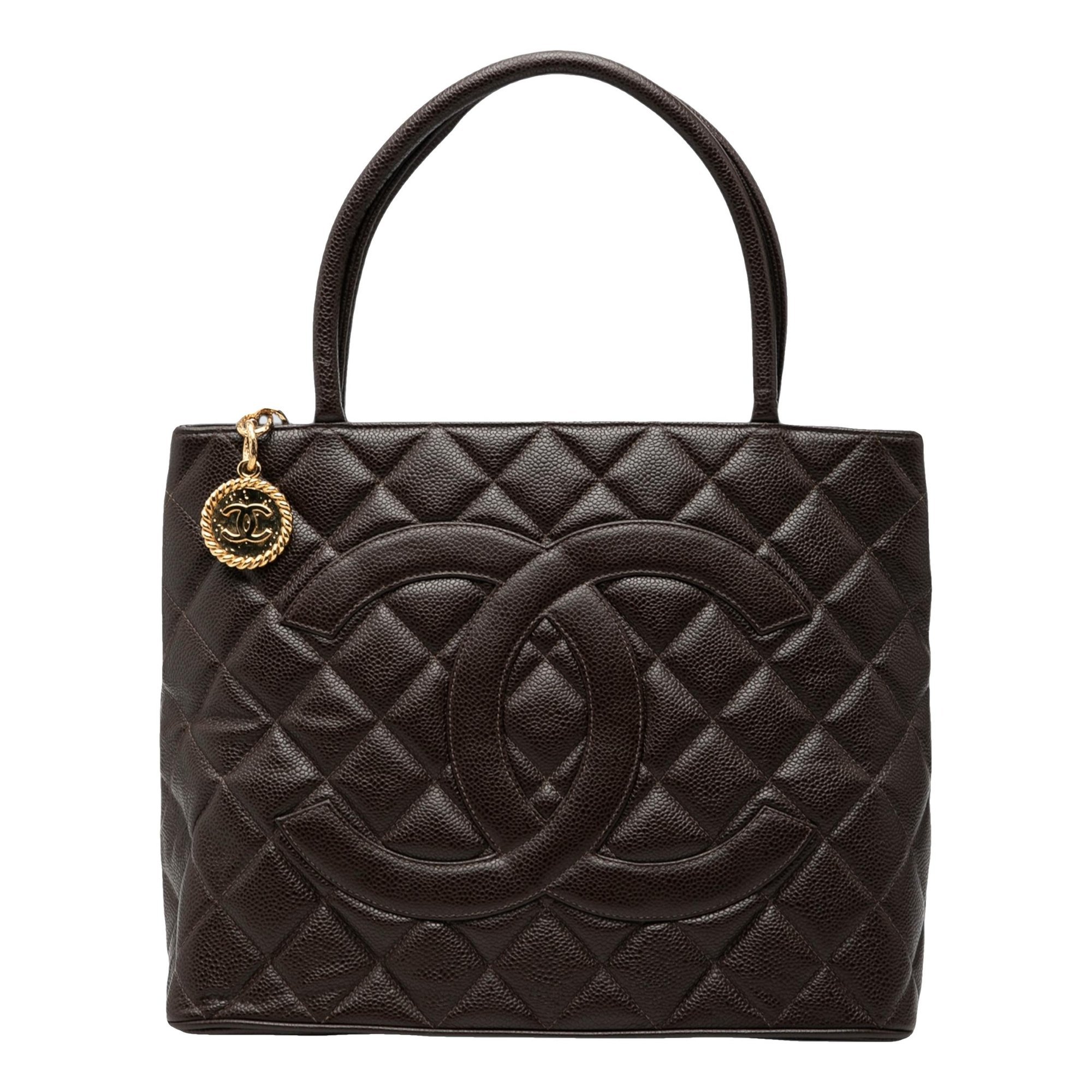 Médaillon leather handbag