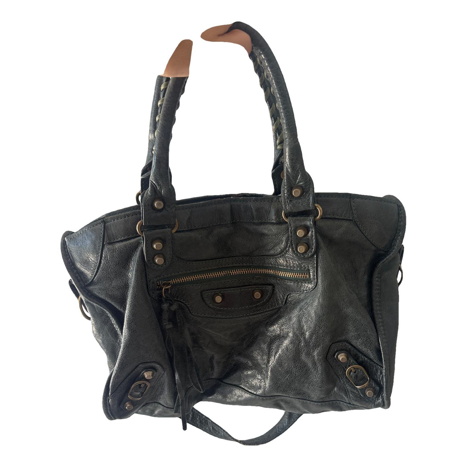 First leather handbag
