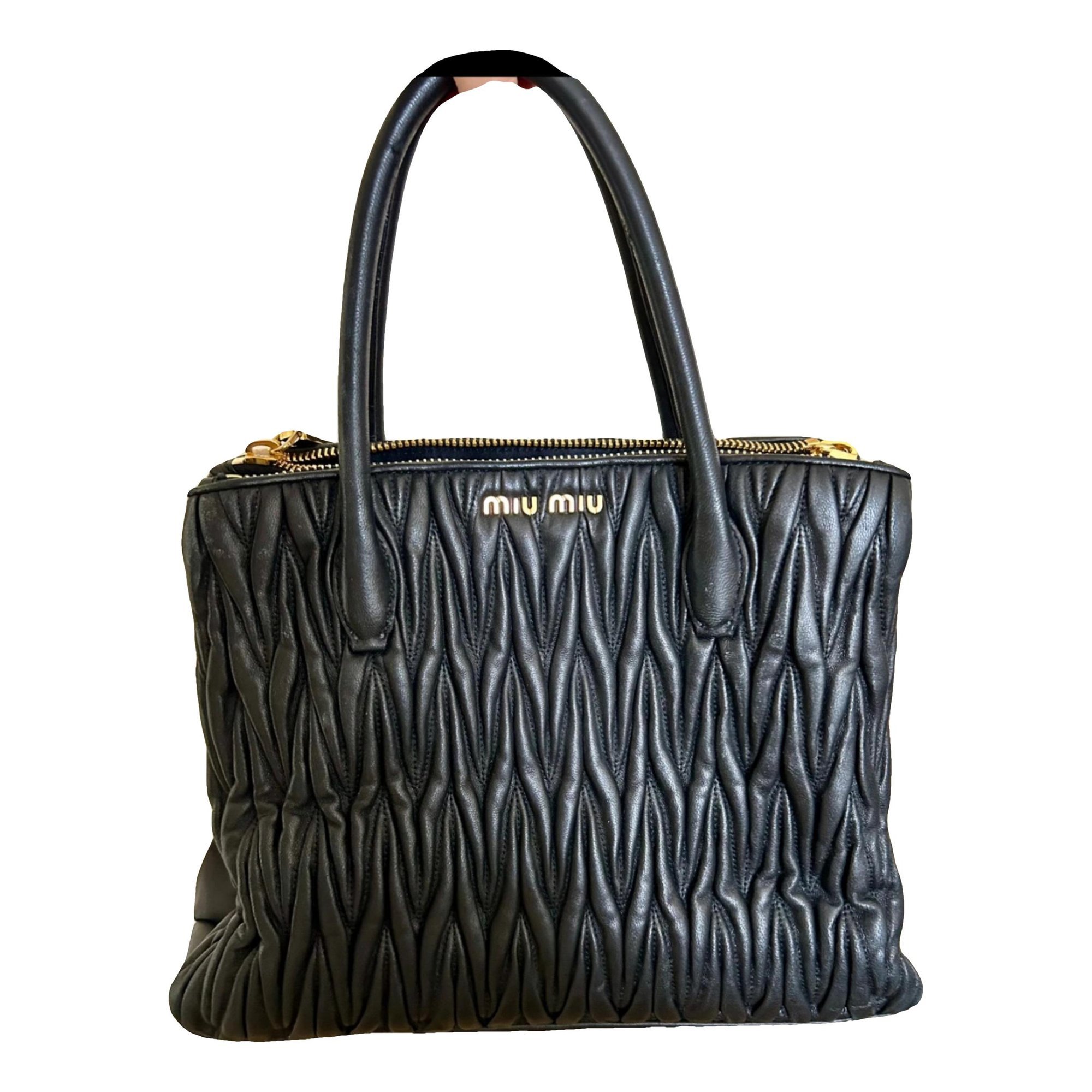 Matelassé leather handbag