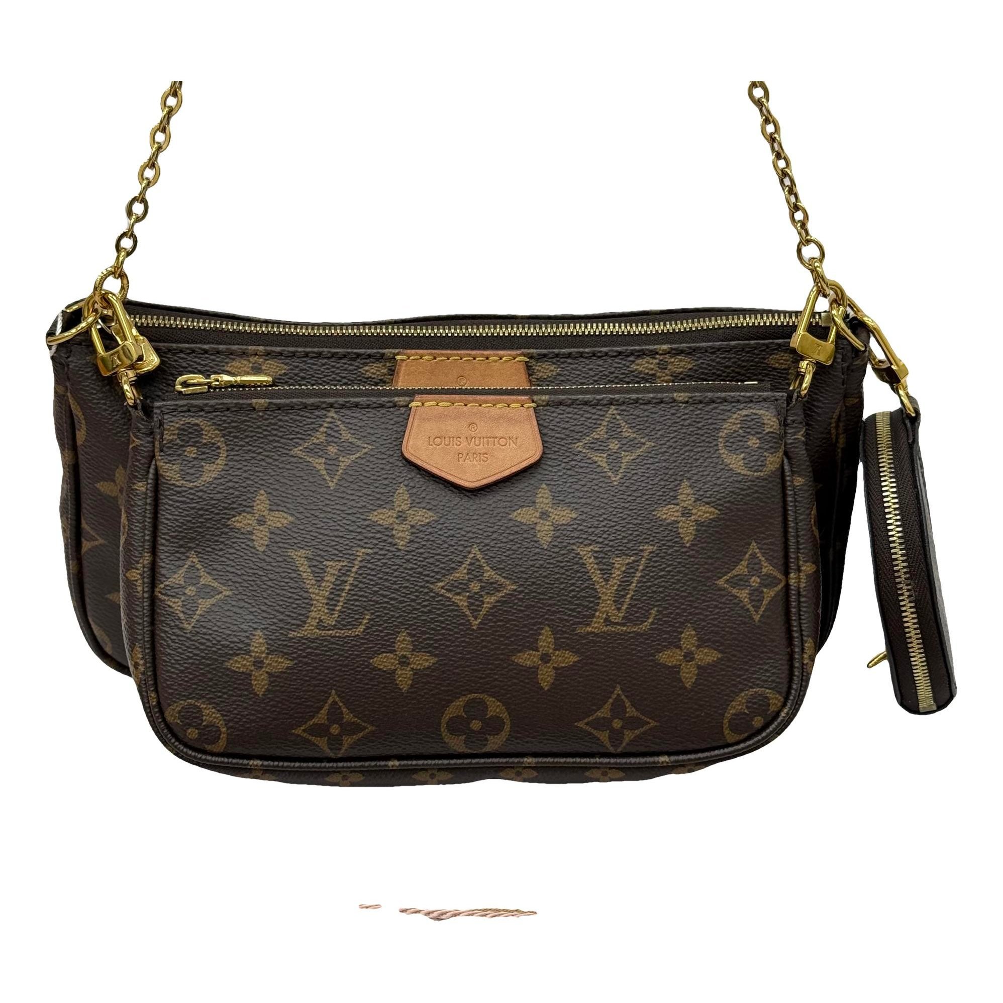 Multi Pochette Accessoires leather handbag