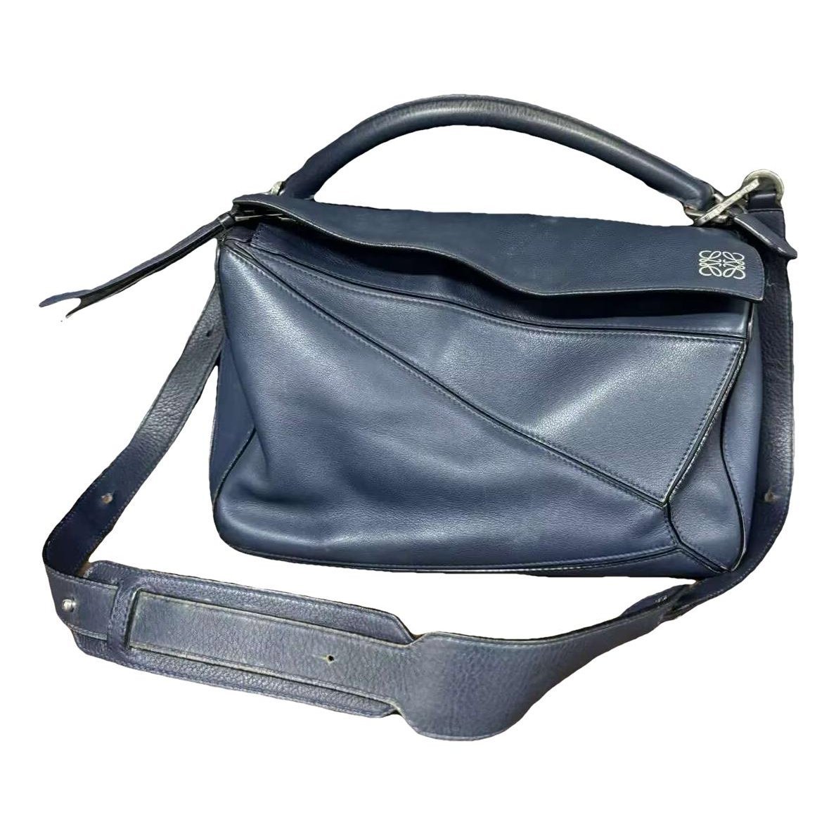 Puzzle leather handbag