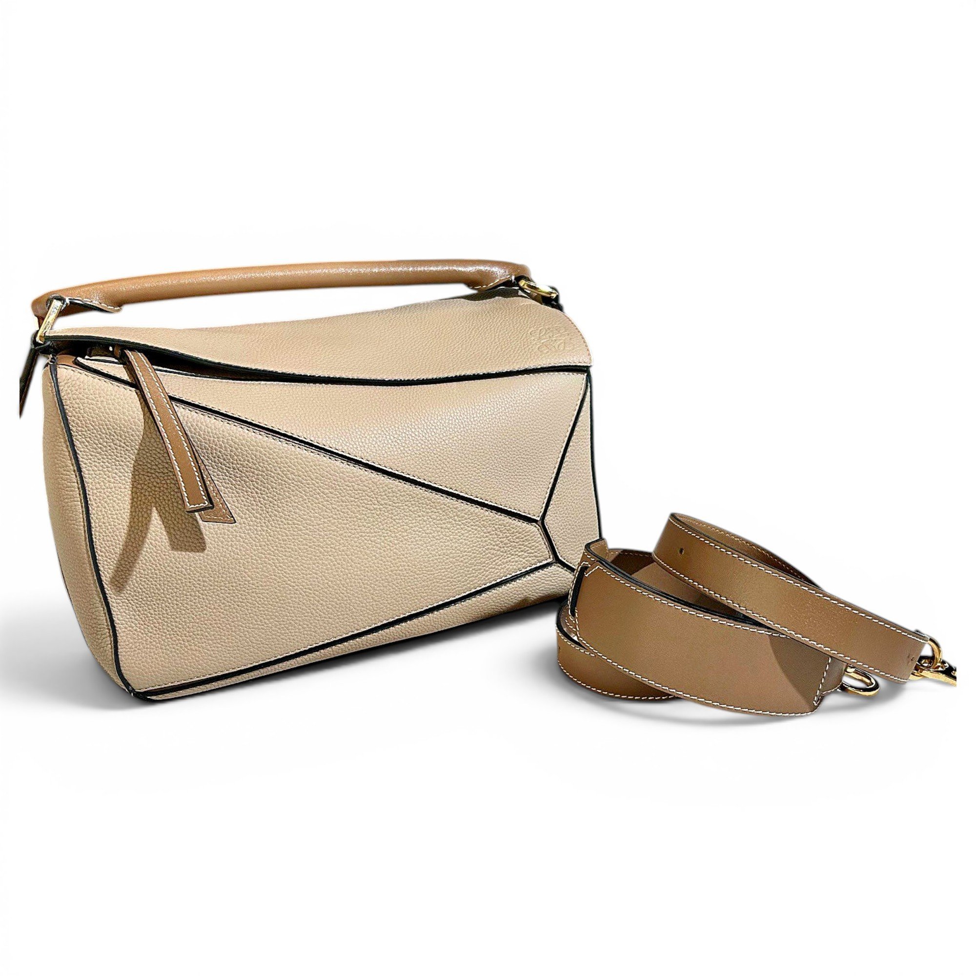 Puzzle leather handbag