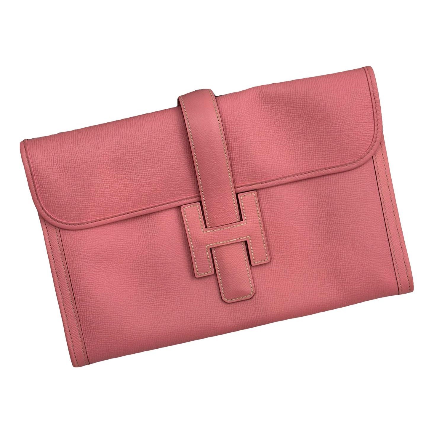 Jige leather clutch bag