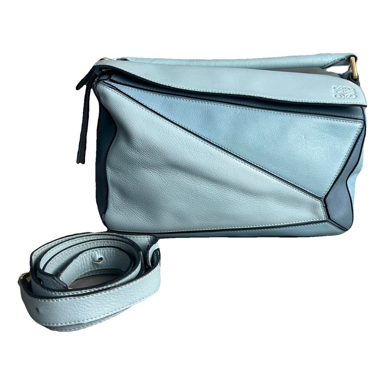 Puzzle leather handbag