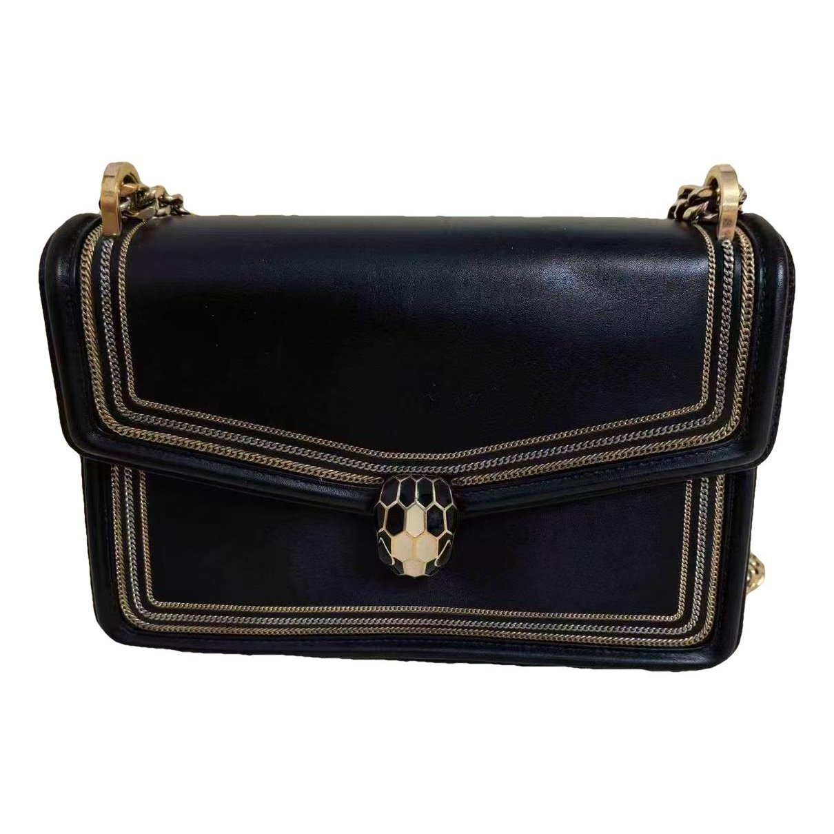 Serpenti leather handbag