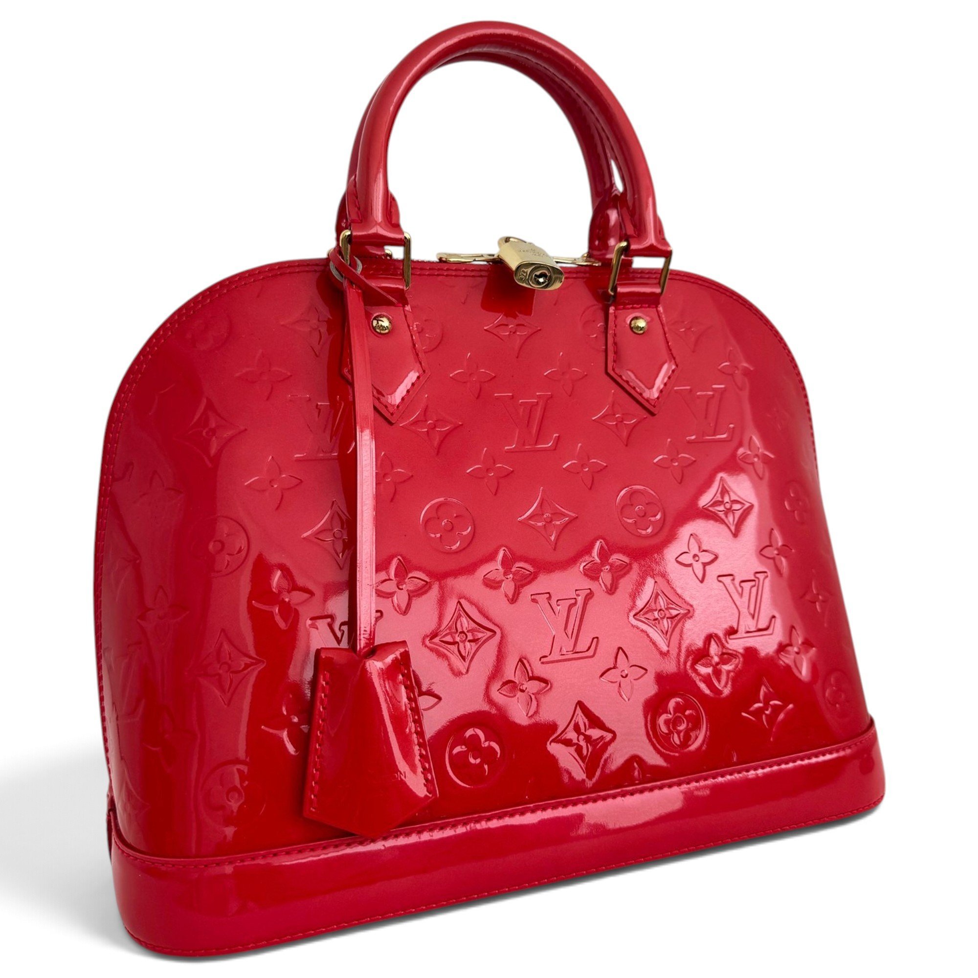 Louis Vuitton Alma patent leather handbag