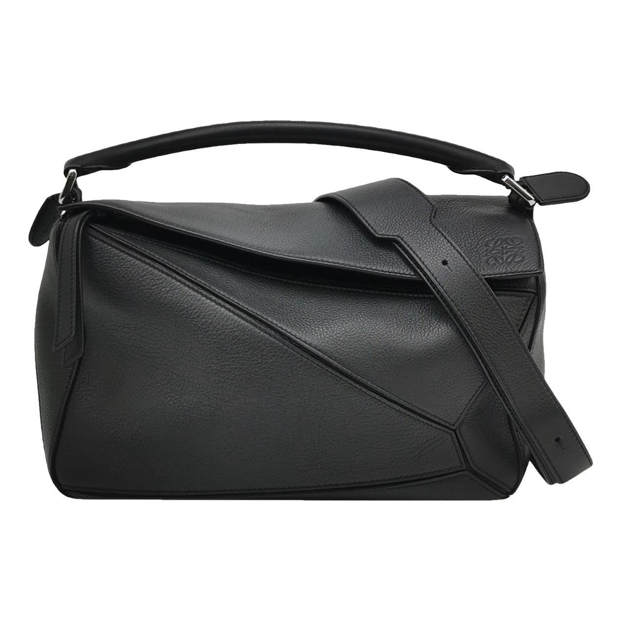 Puzzle leather handbag