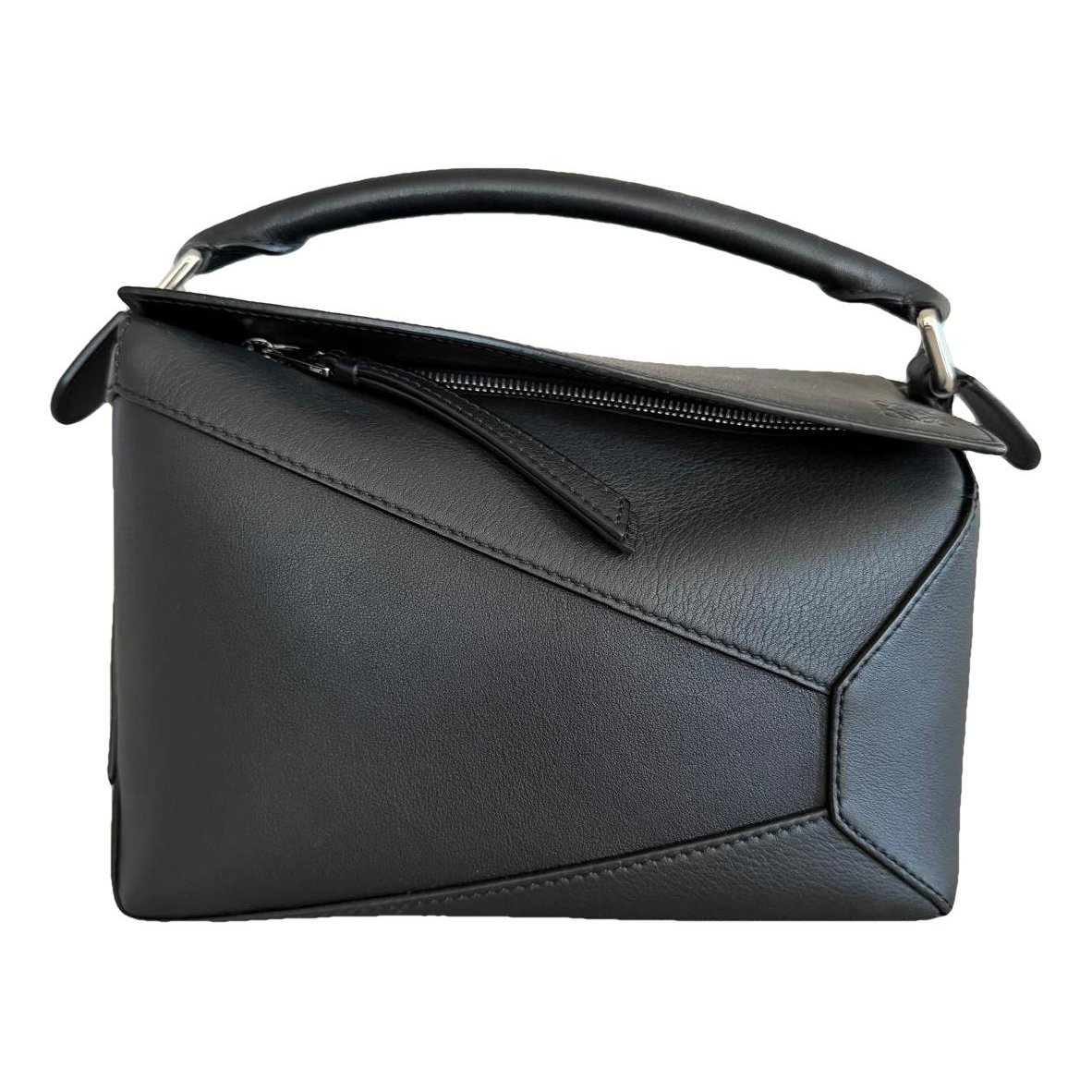 Puzzle leather handbag