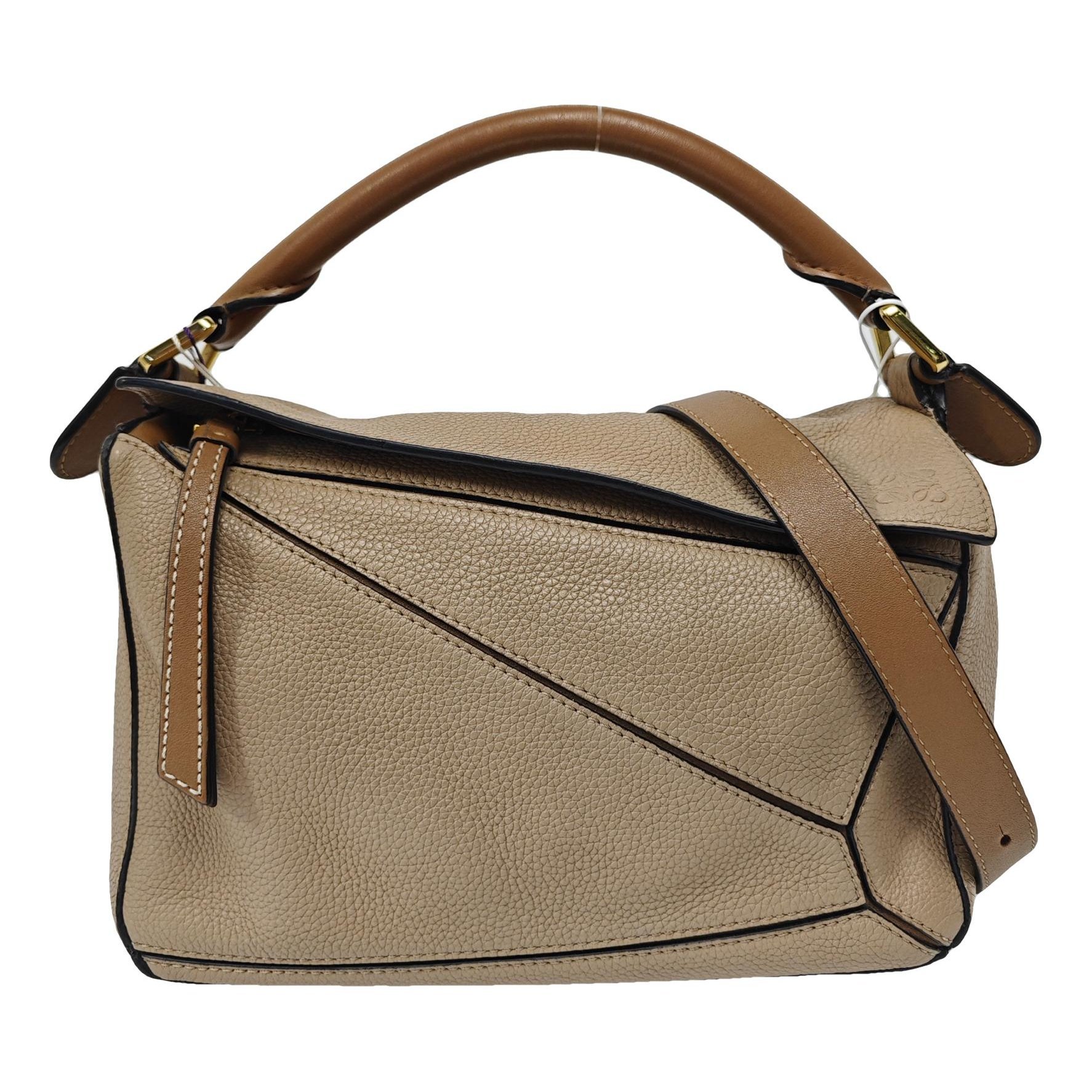 Puzzle leather handbag