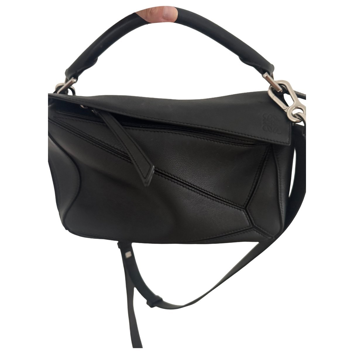 Puzzle leather handbag