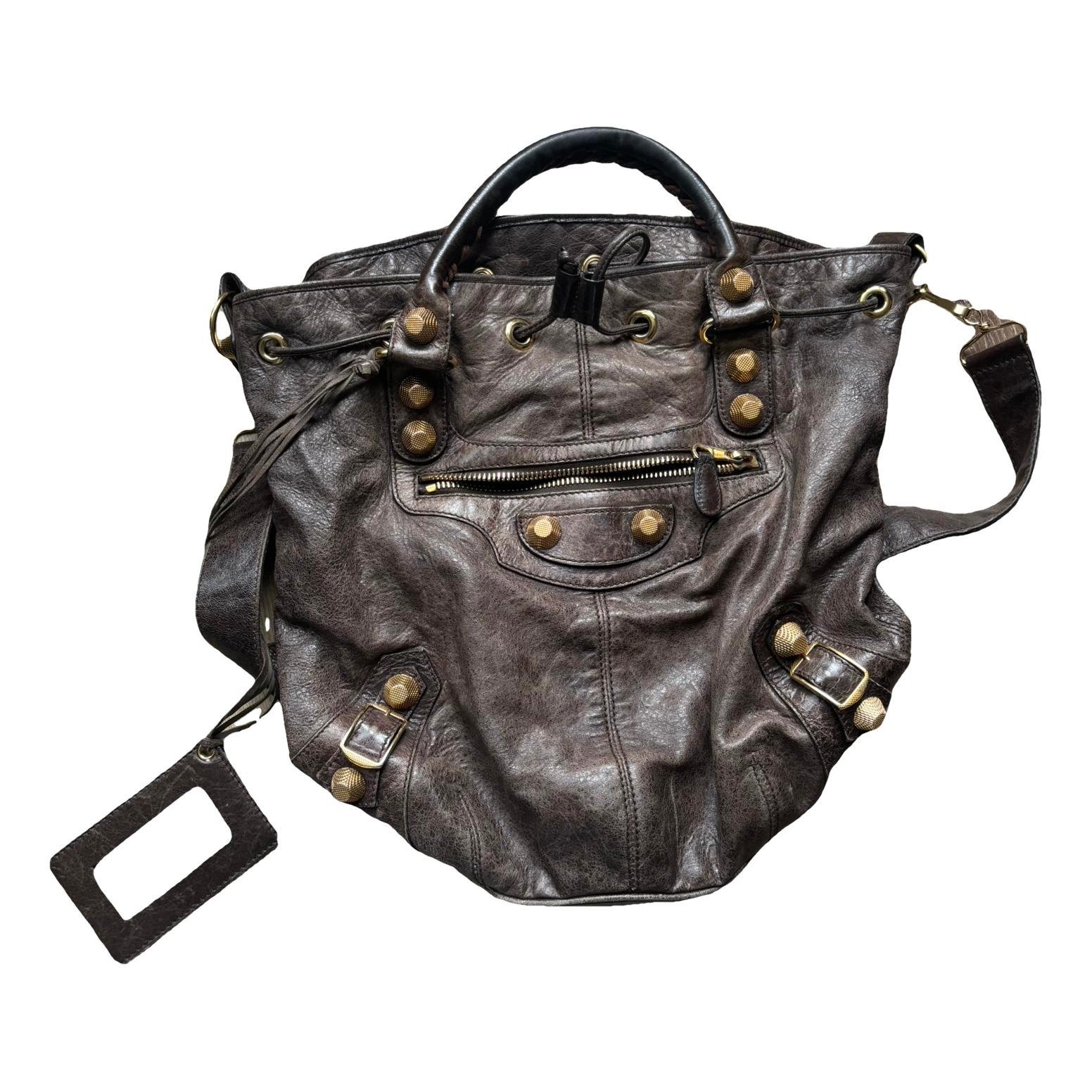 Pompon leather crossbody bag