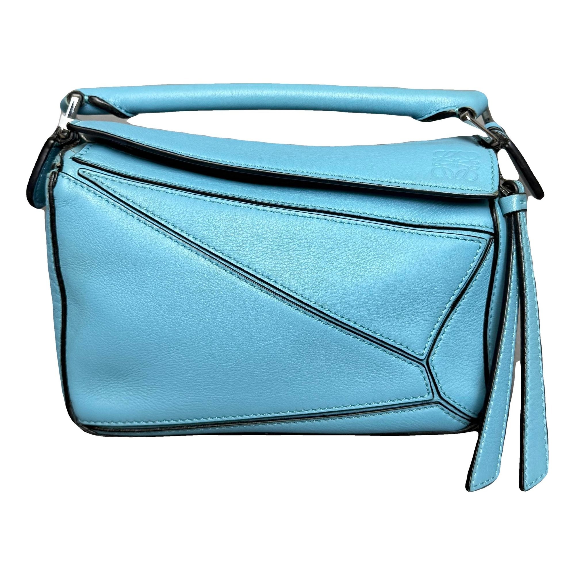 Puzzle leather handbag