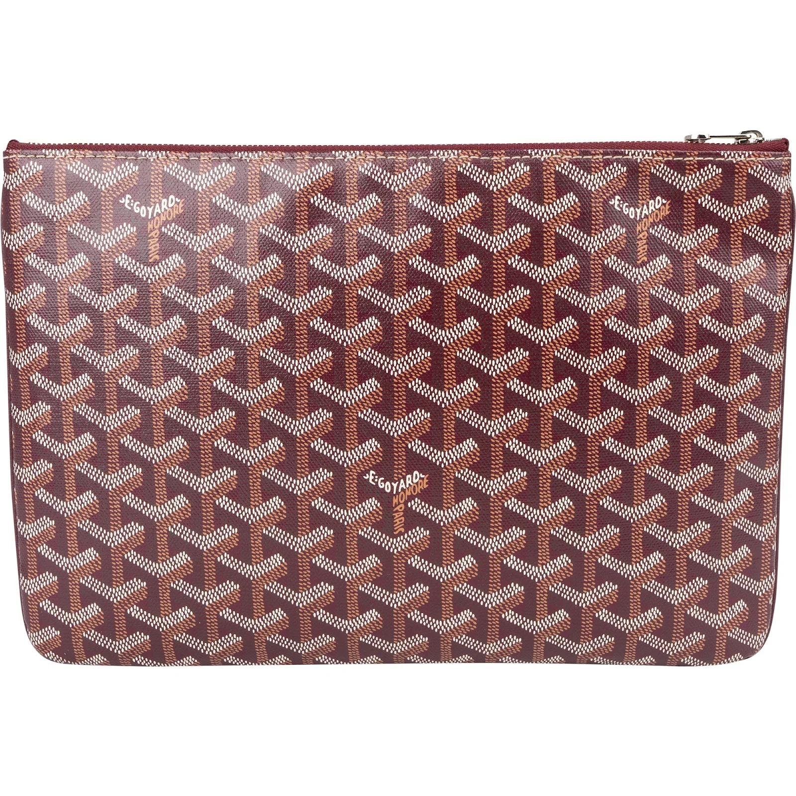 Goyard Sénat leather clutch bag
