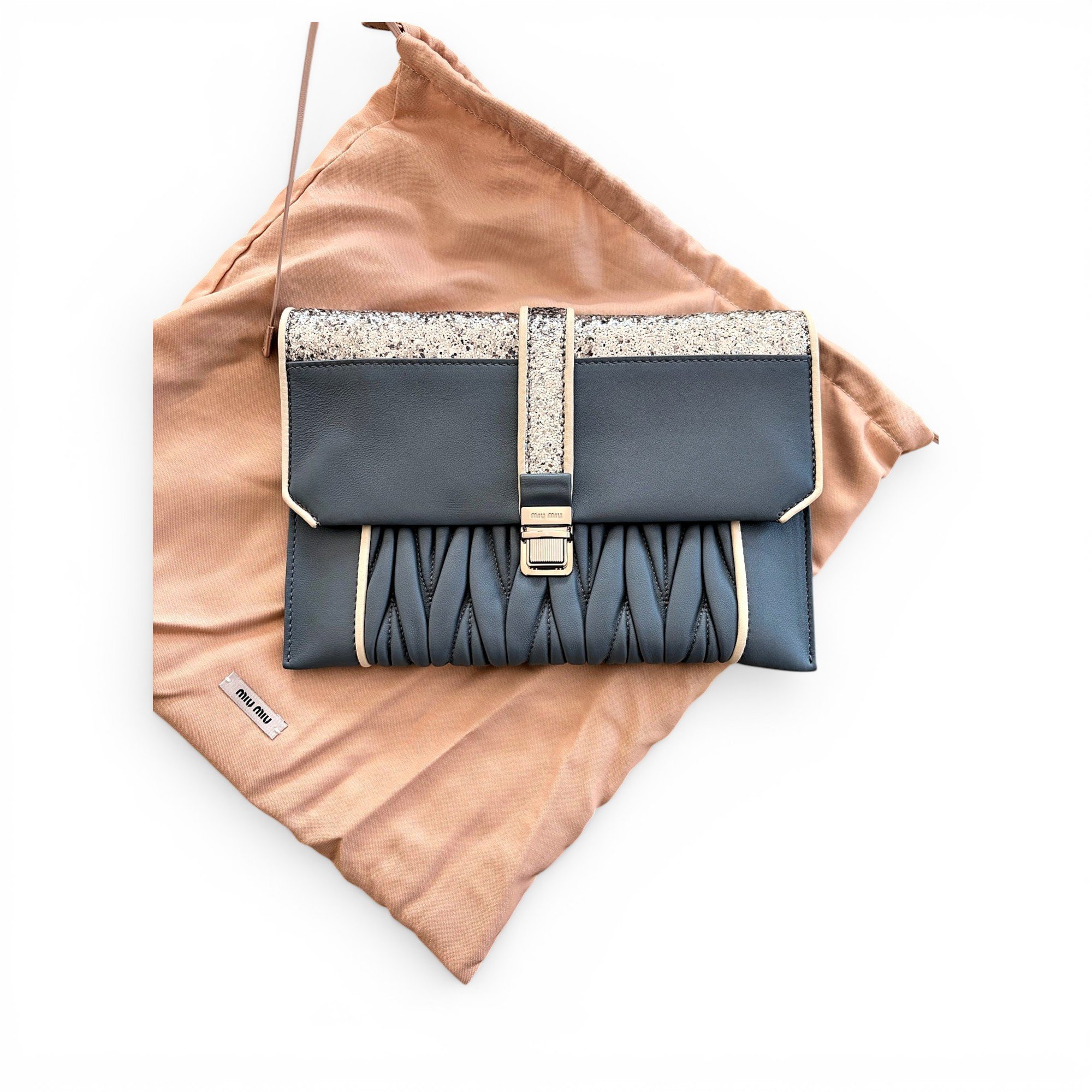 Matelassé leather clutch bag