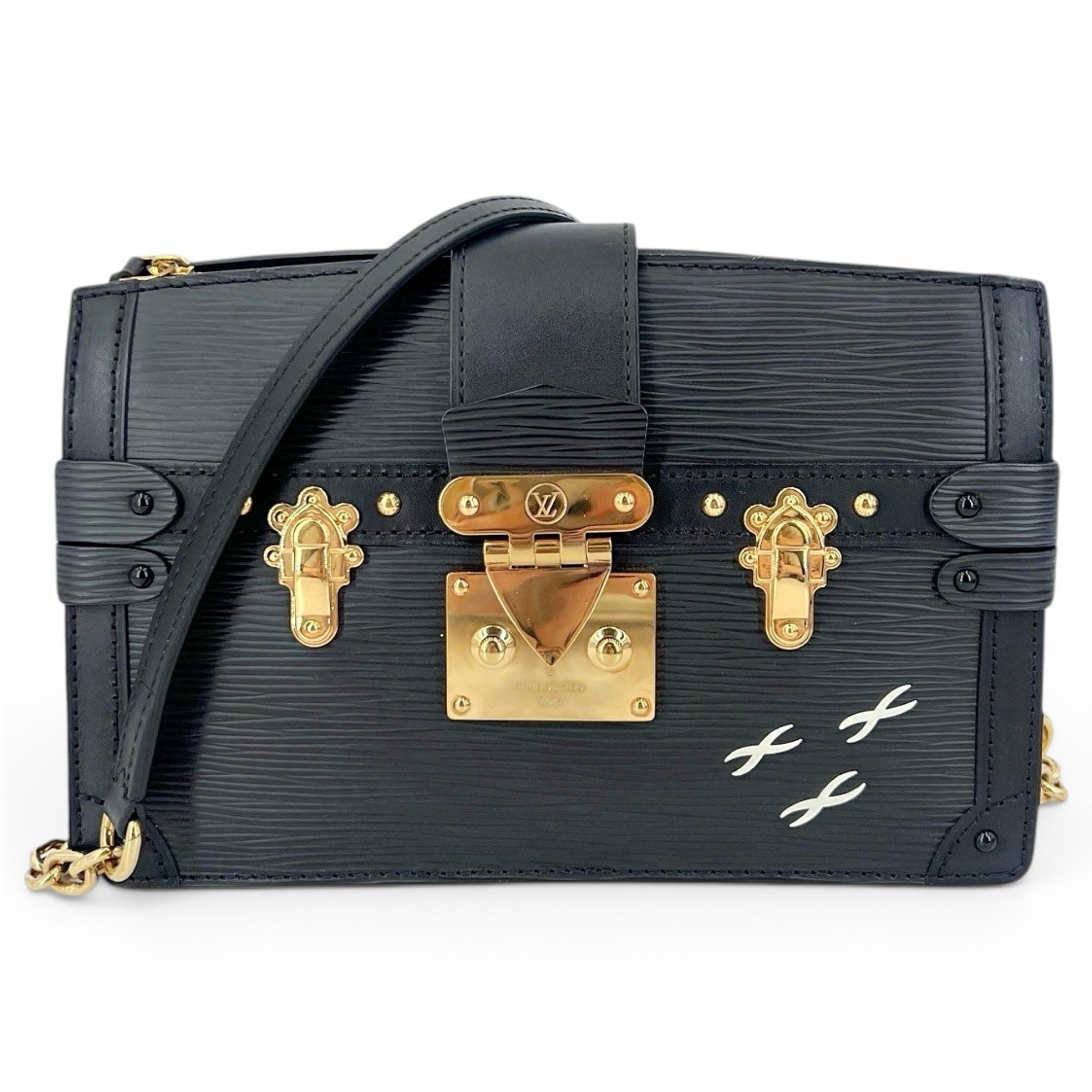 Pochette Trunk leather handbag