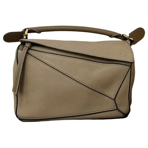 Puzzle leather handbag