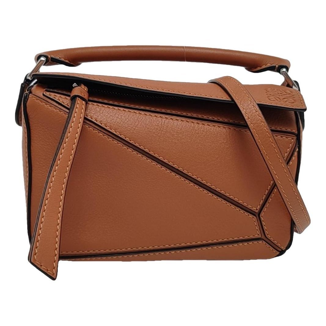 Puzzle leather handbag