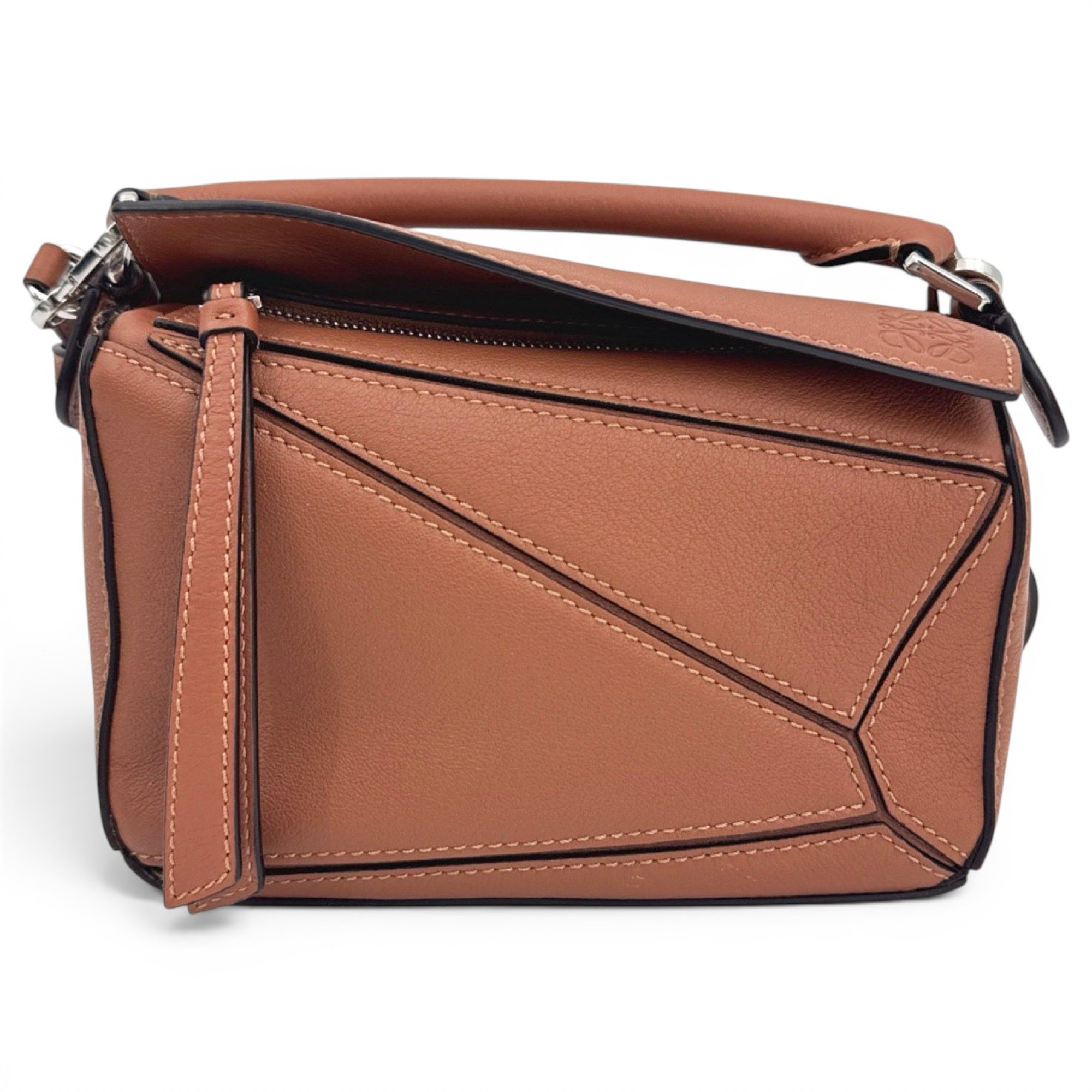 Puzzle leather handbag