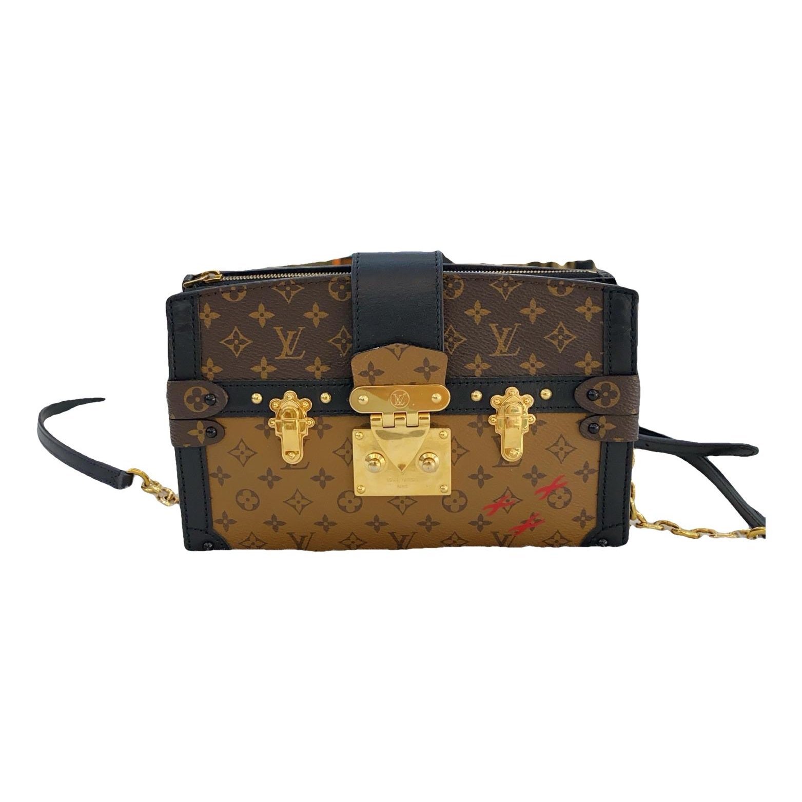 Pochette Trunk leather handbag