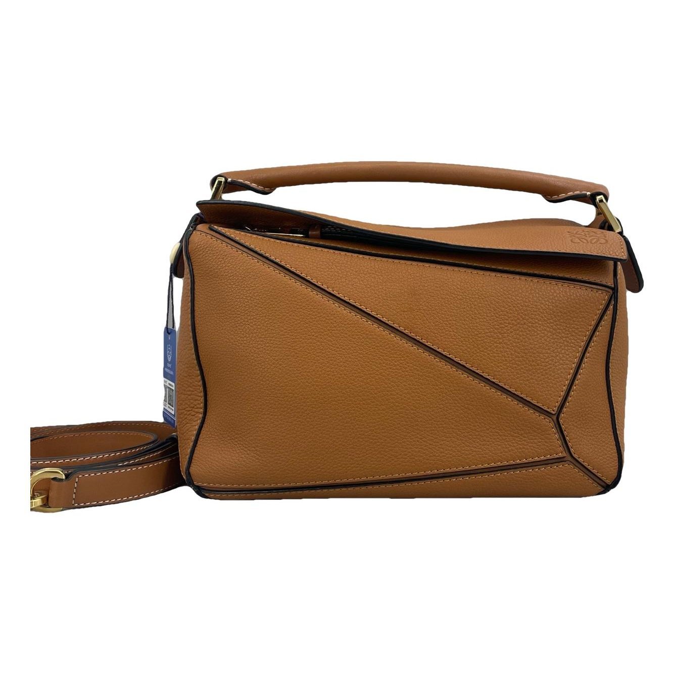 Puzzle leather handbag