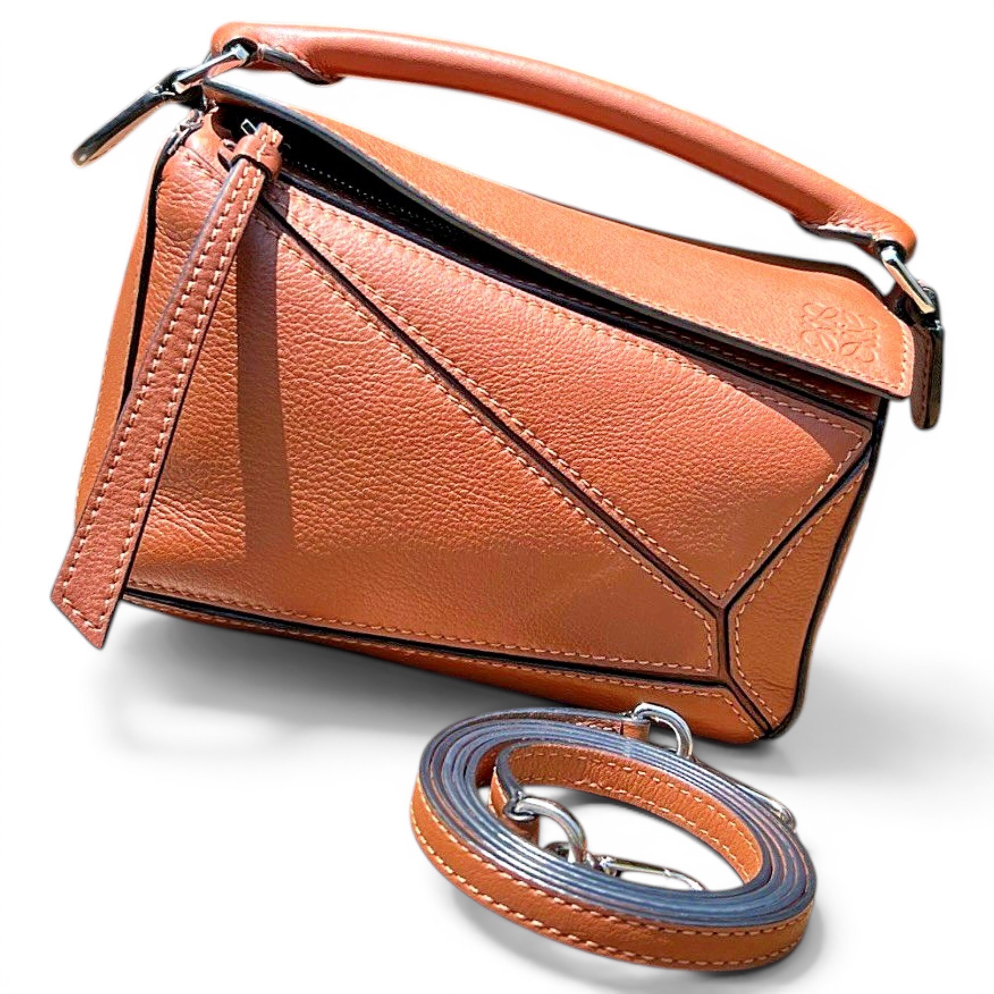 Puzzle leather handbag
