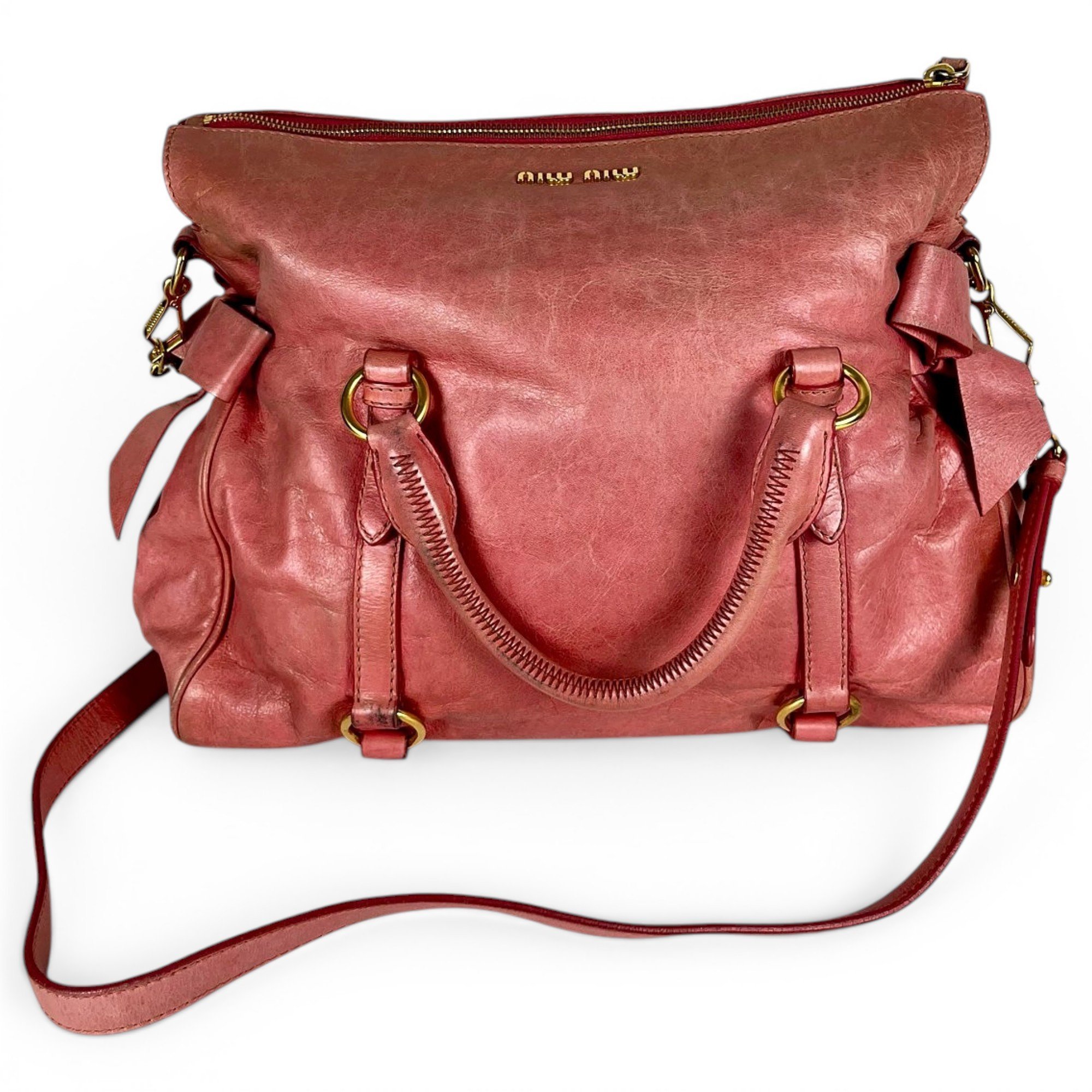 Bow bag leather handbag