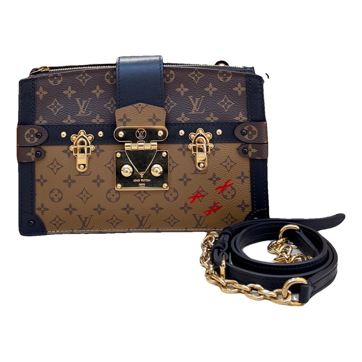 Pochette Trunk leather handbag