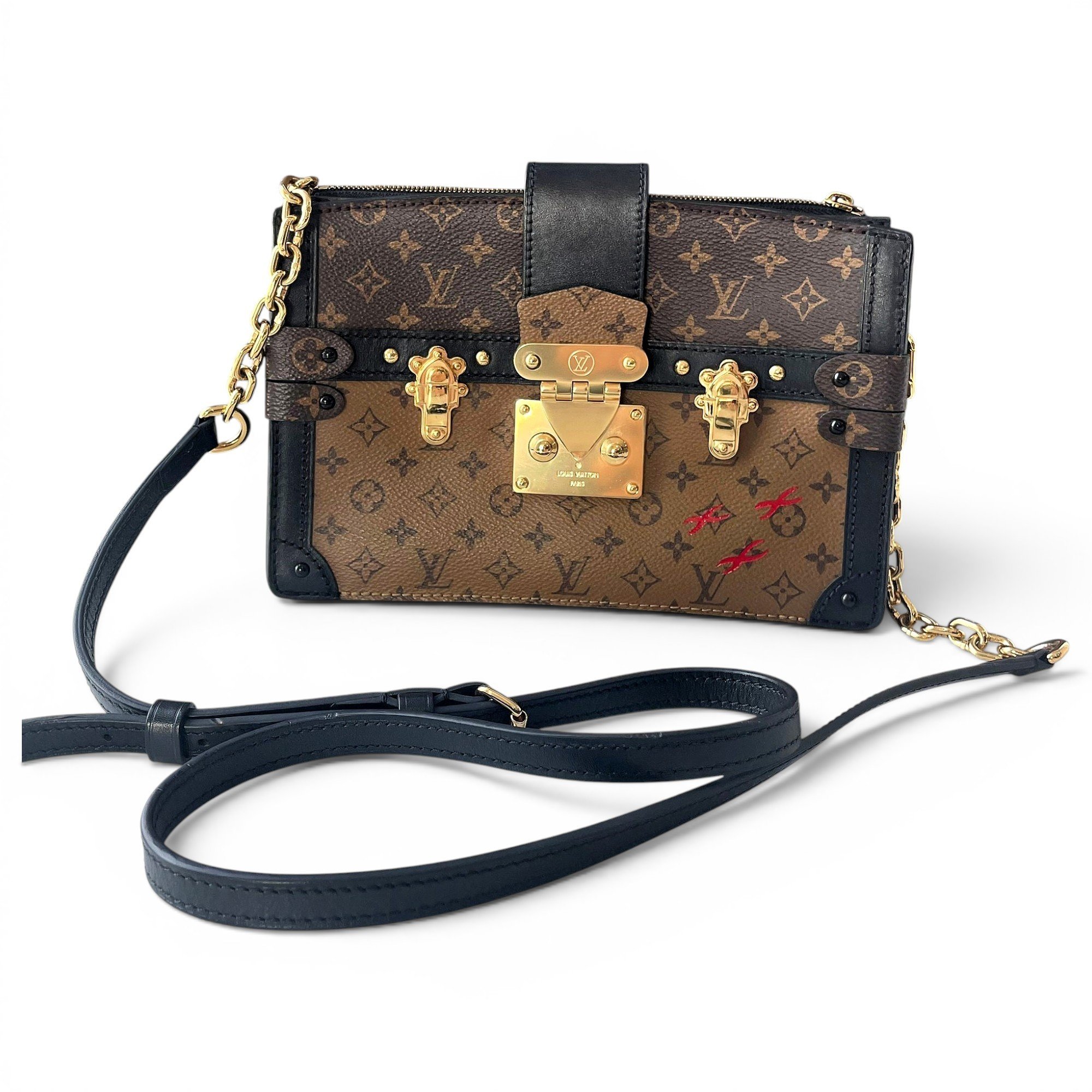Pochette Trunk leather handbag