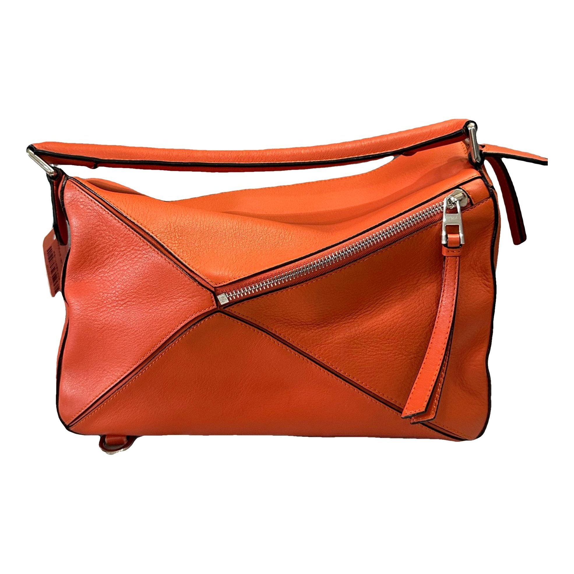 Puzzle leather handbag