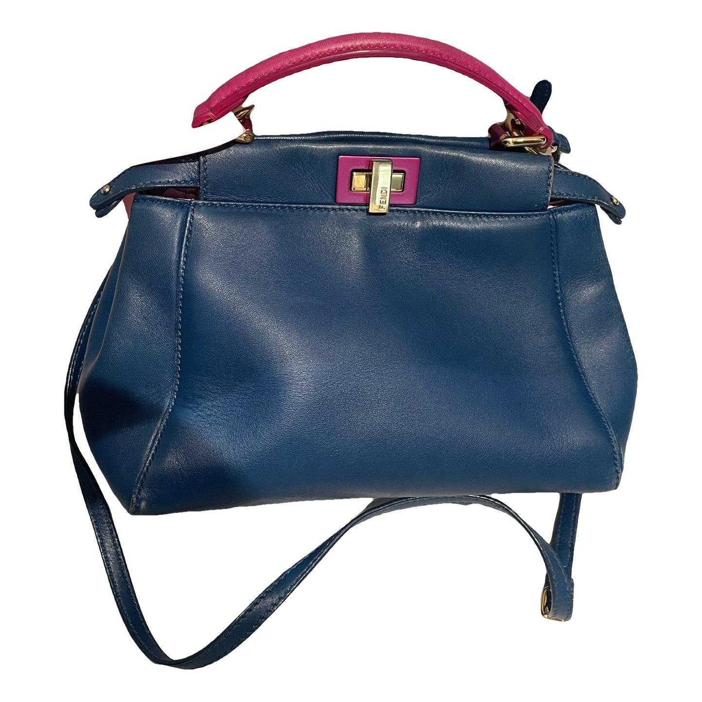 Peekaboo mini pocket leather handbag