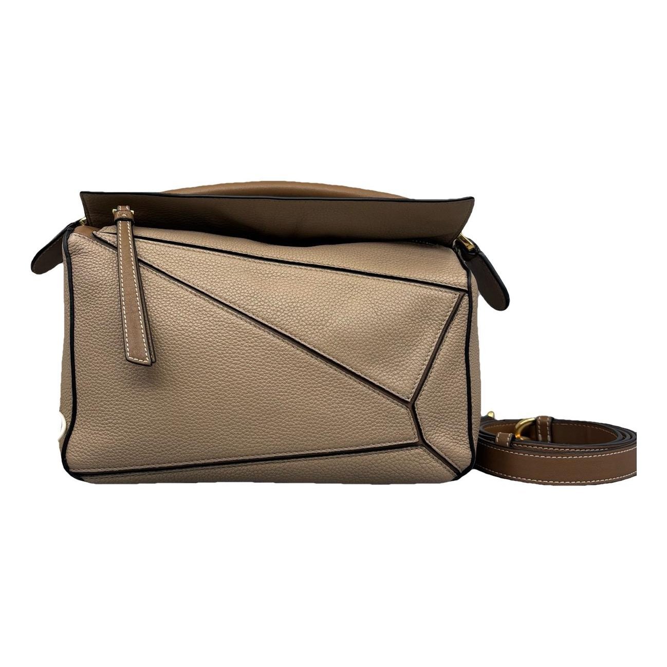 Puzzle leather handbag