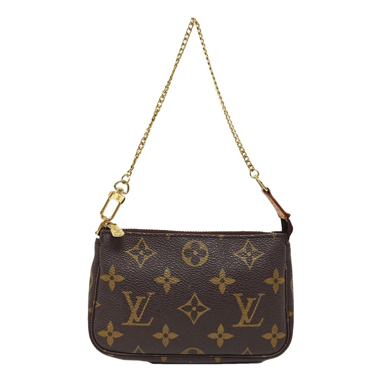 Maxi Multi Pochette Accessoires leather handbag
