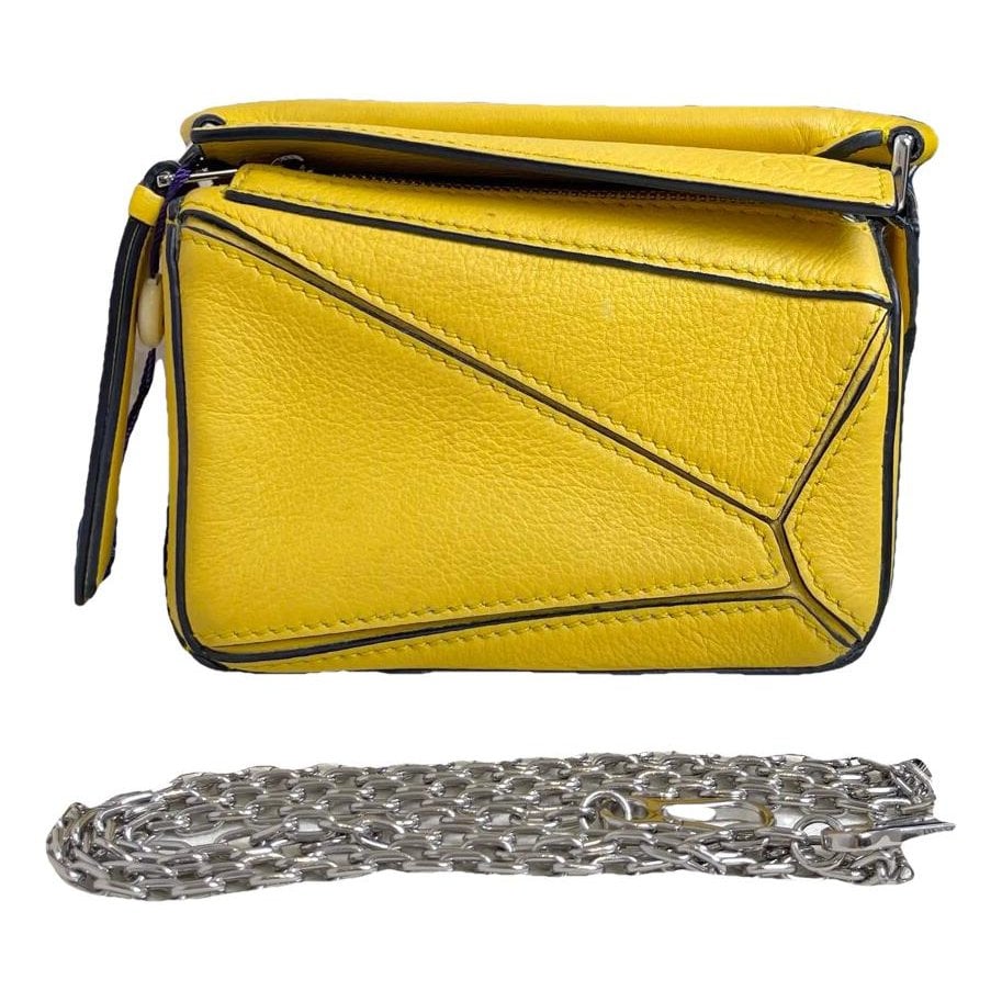 Puzzle leather handbag