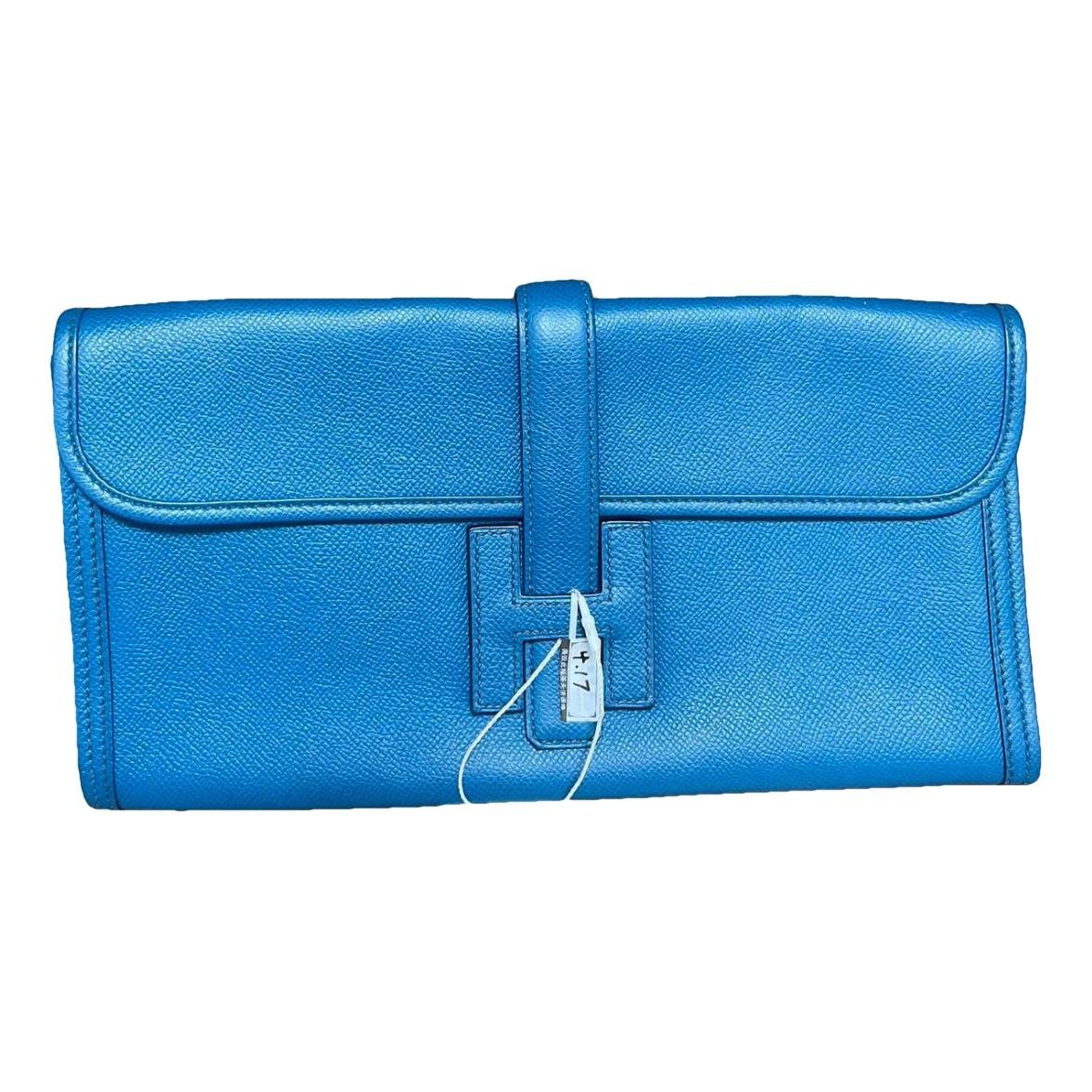 Jige leather clutch bag