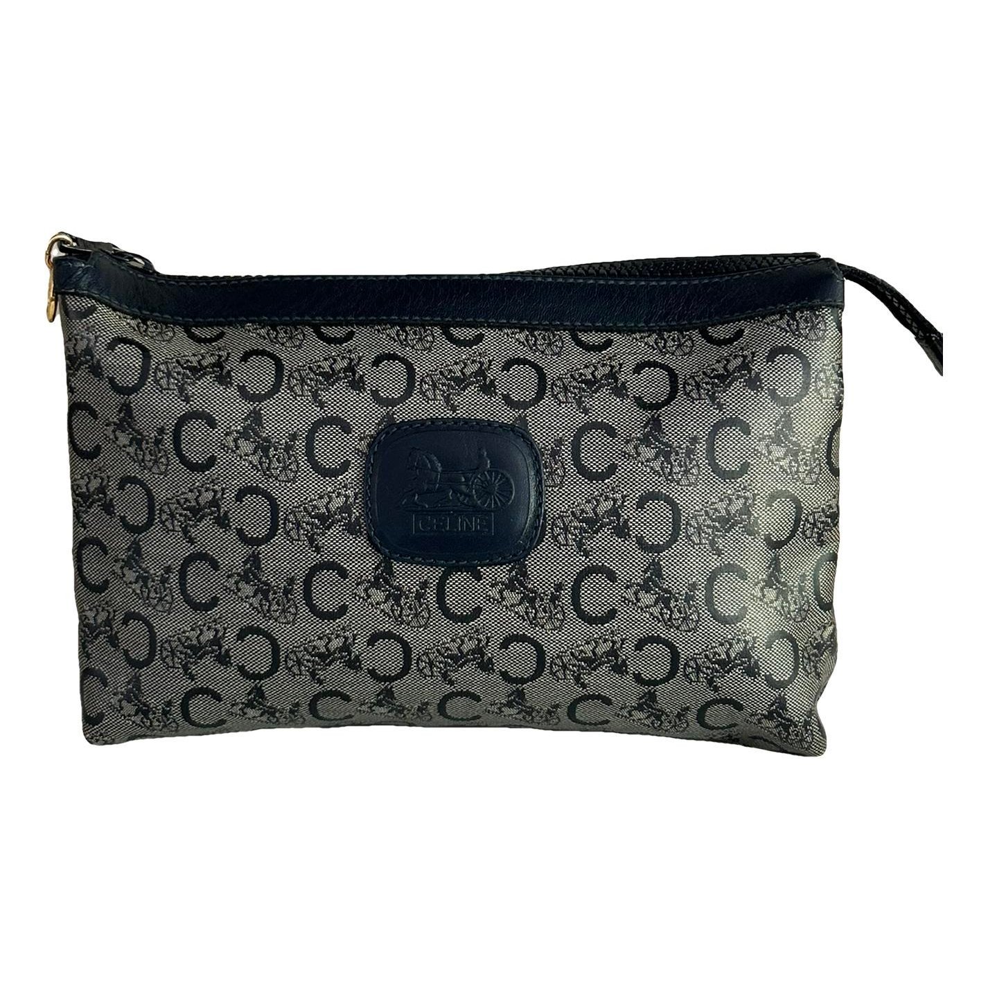 Triomphe Vintage cloth clutch bag