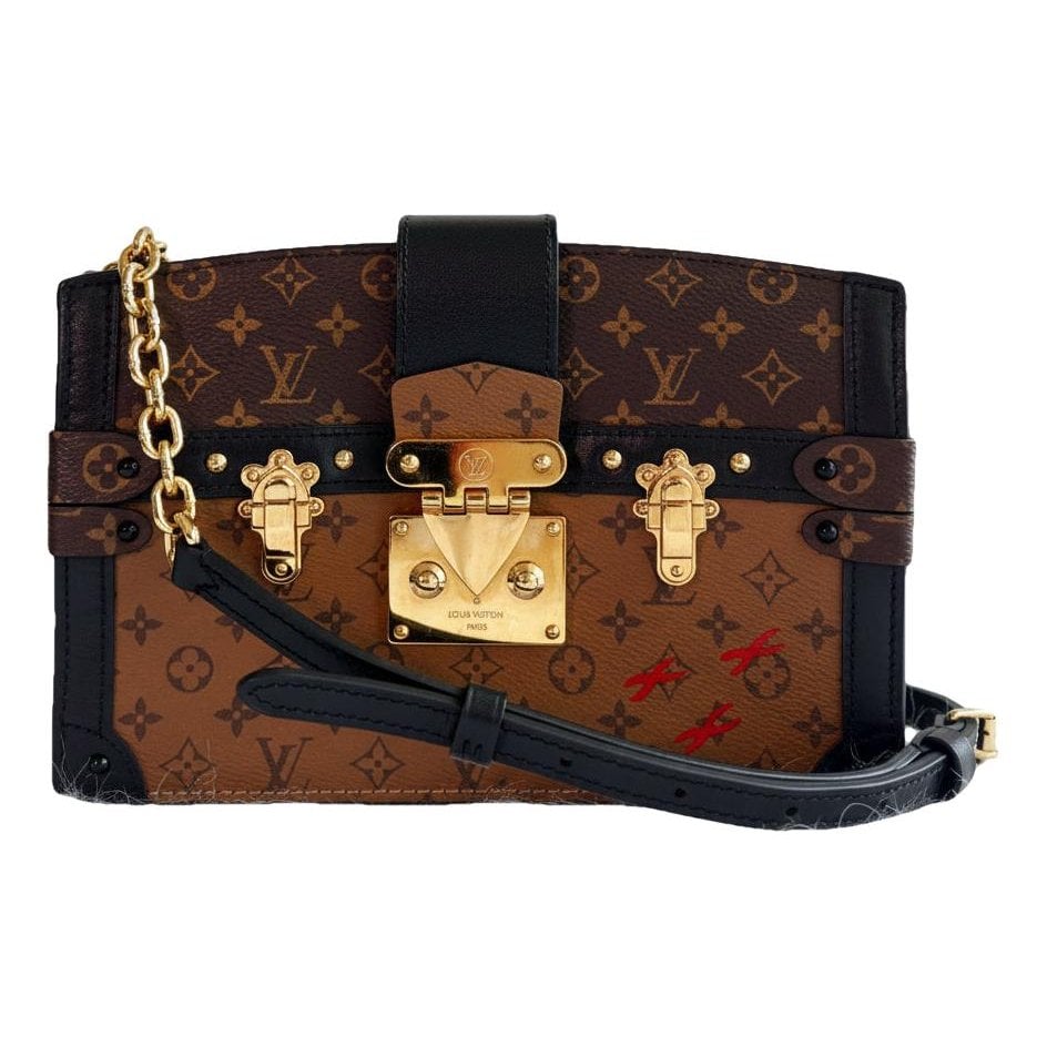 Pochette Trunk leather handbag