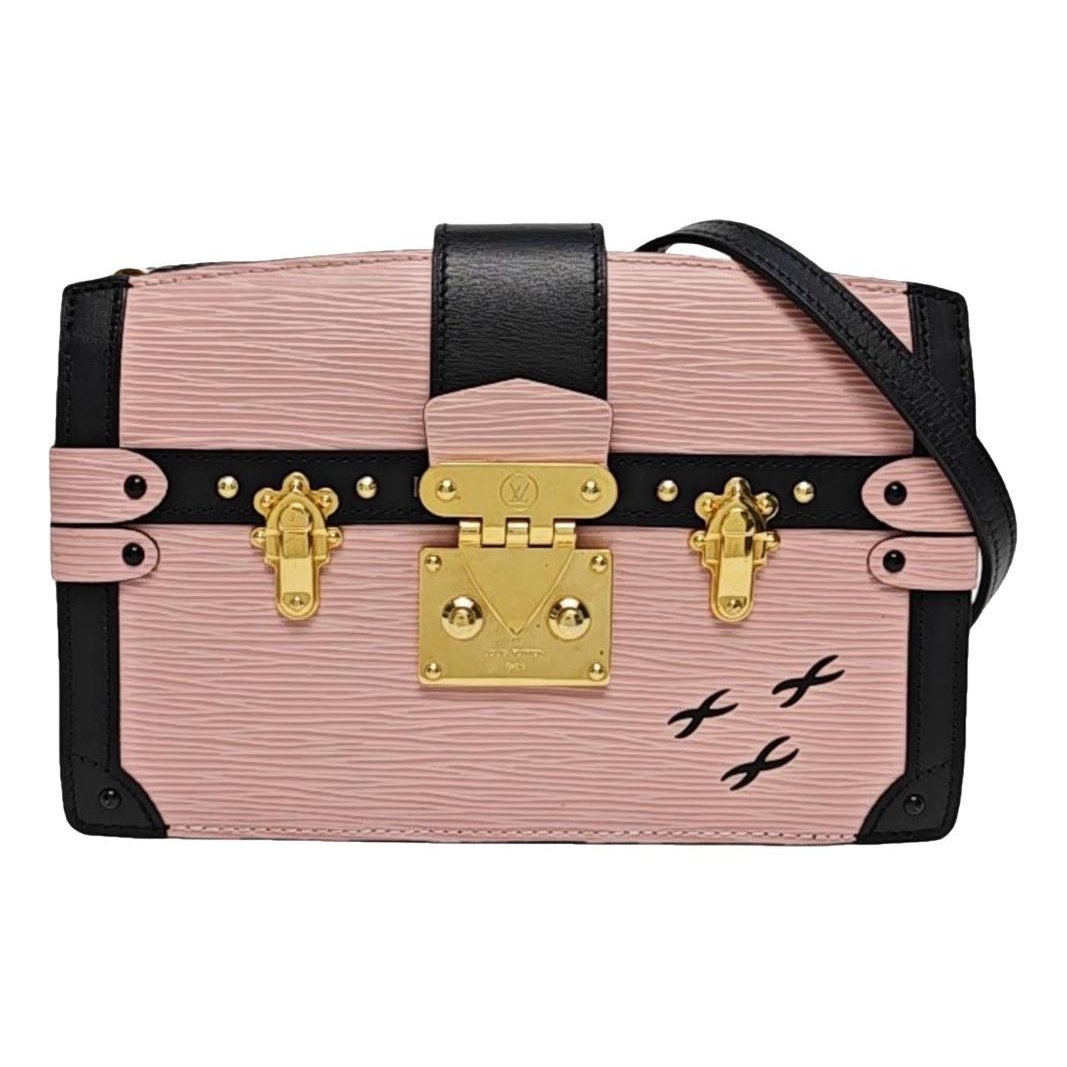 Pochette Trunk leather handbag