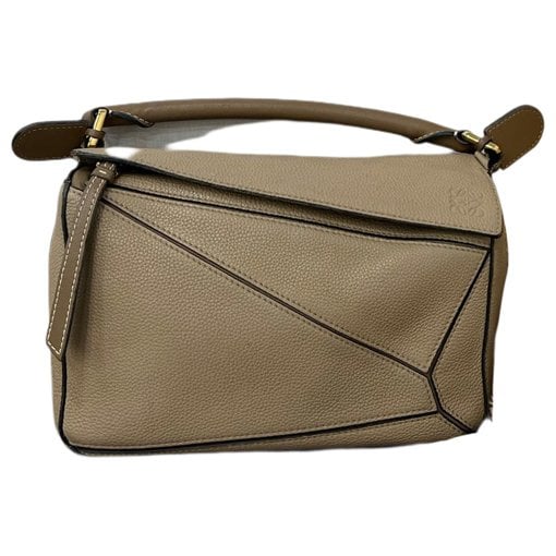 Puzzle leather handbag