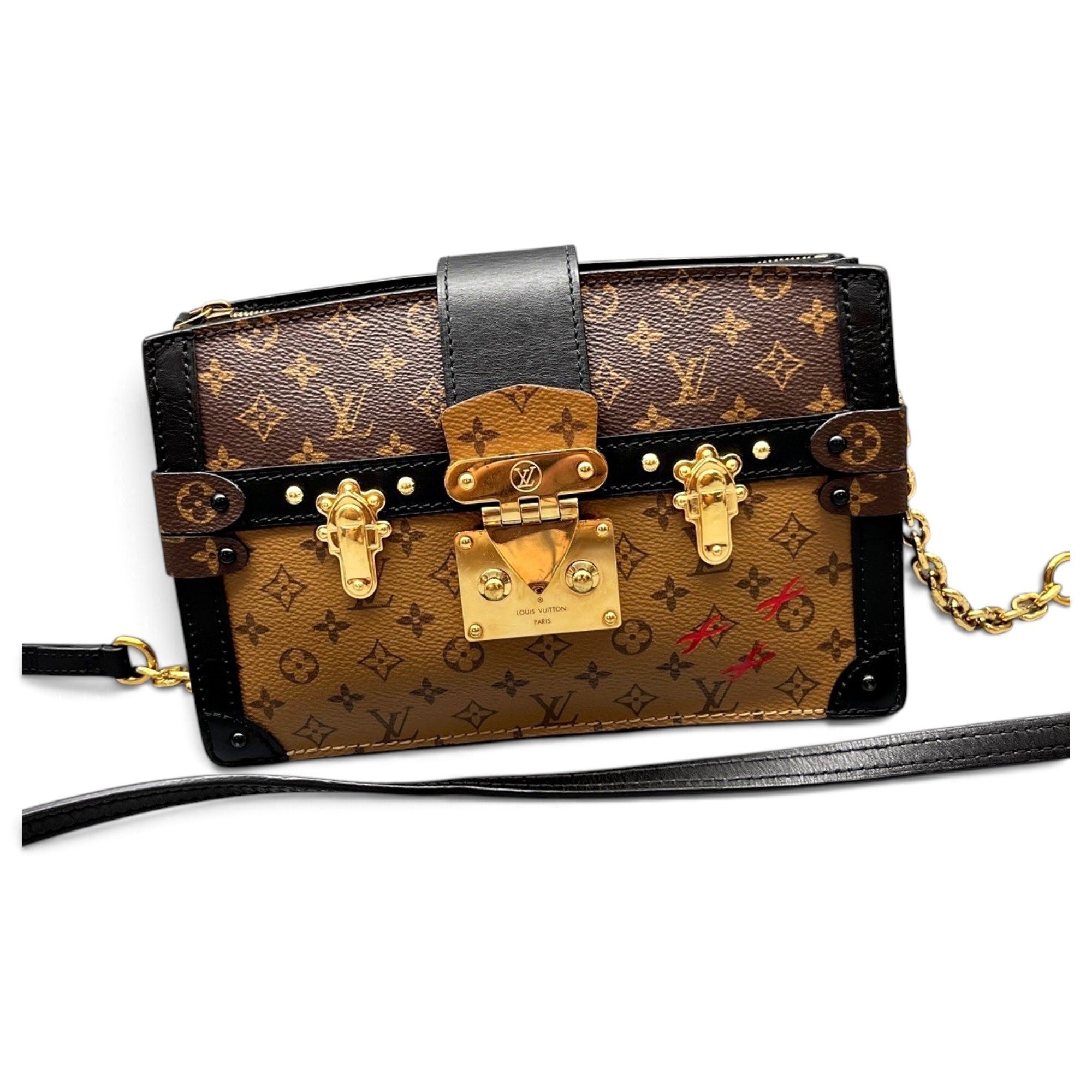 Pochette Trunk leather handbag