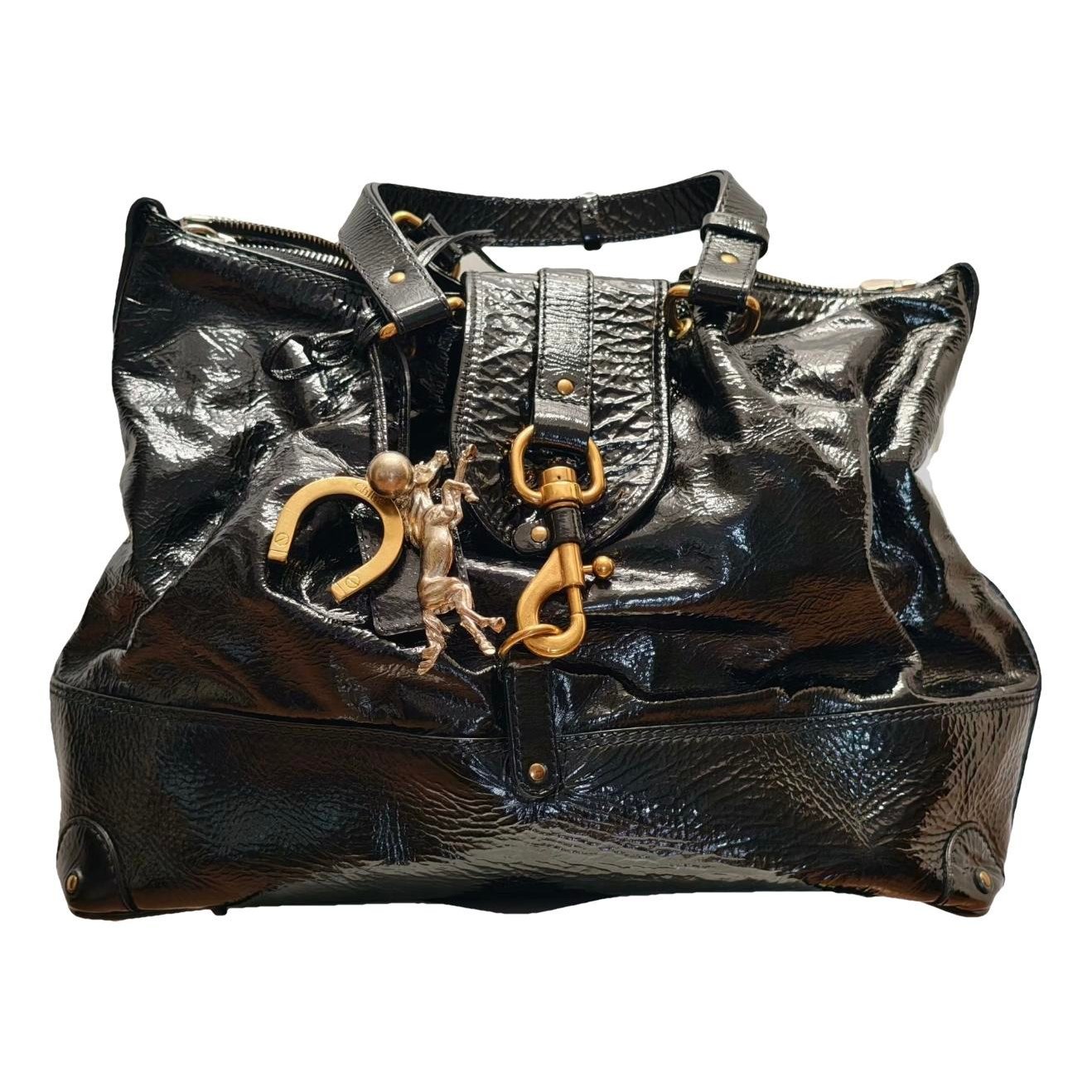 Kerala patent leather bag