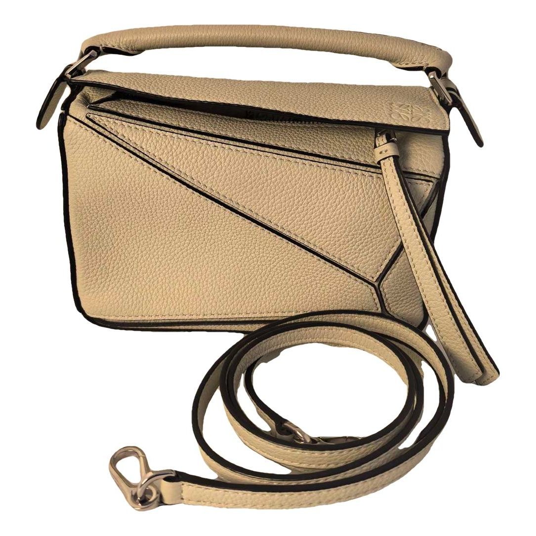 Puzzle leather handbag