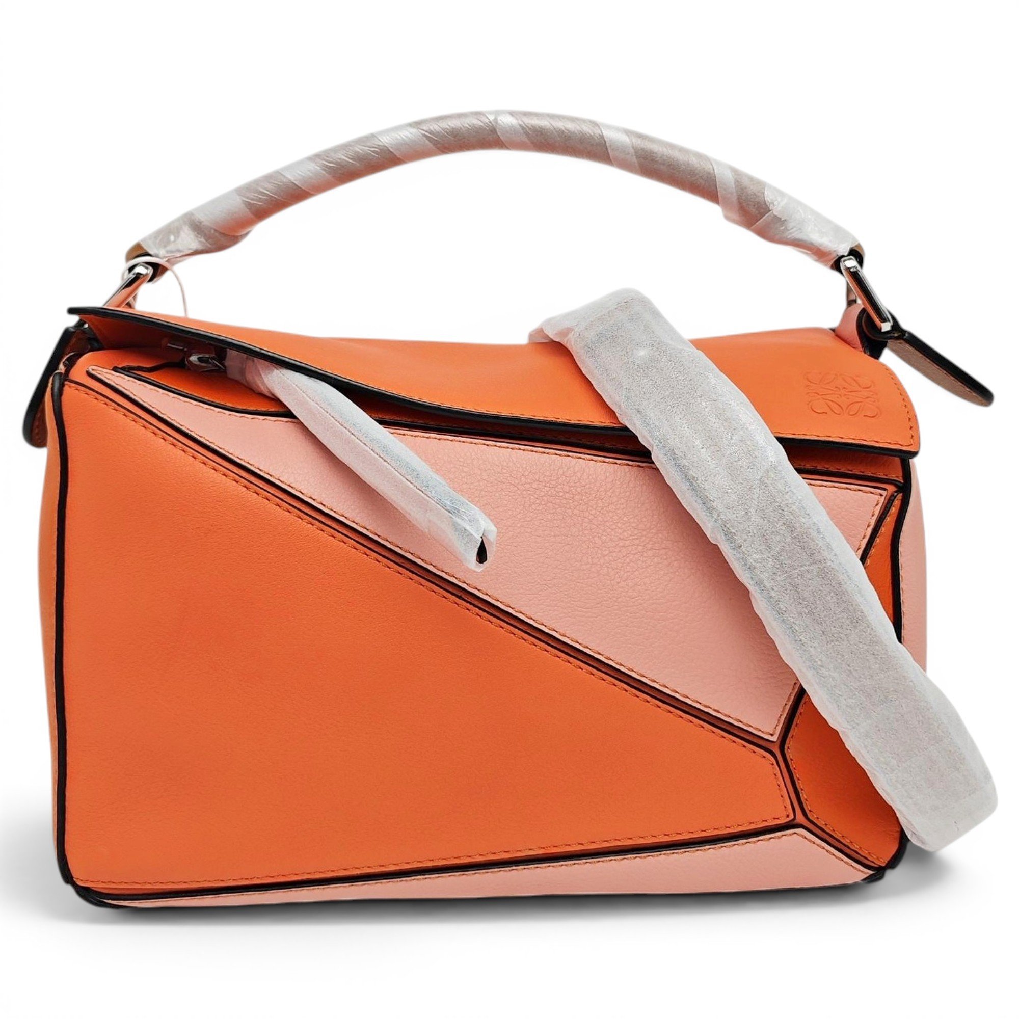 Puzzle leather handbag