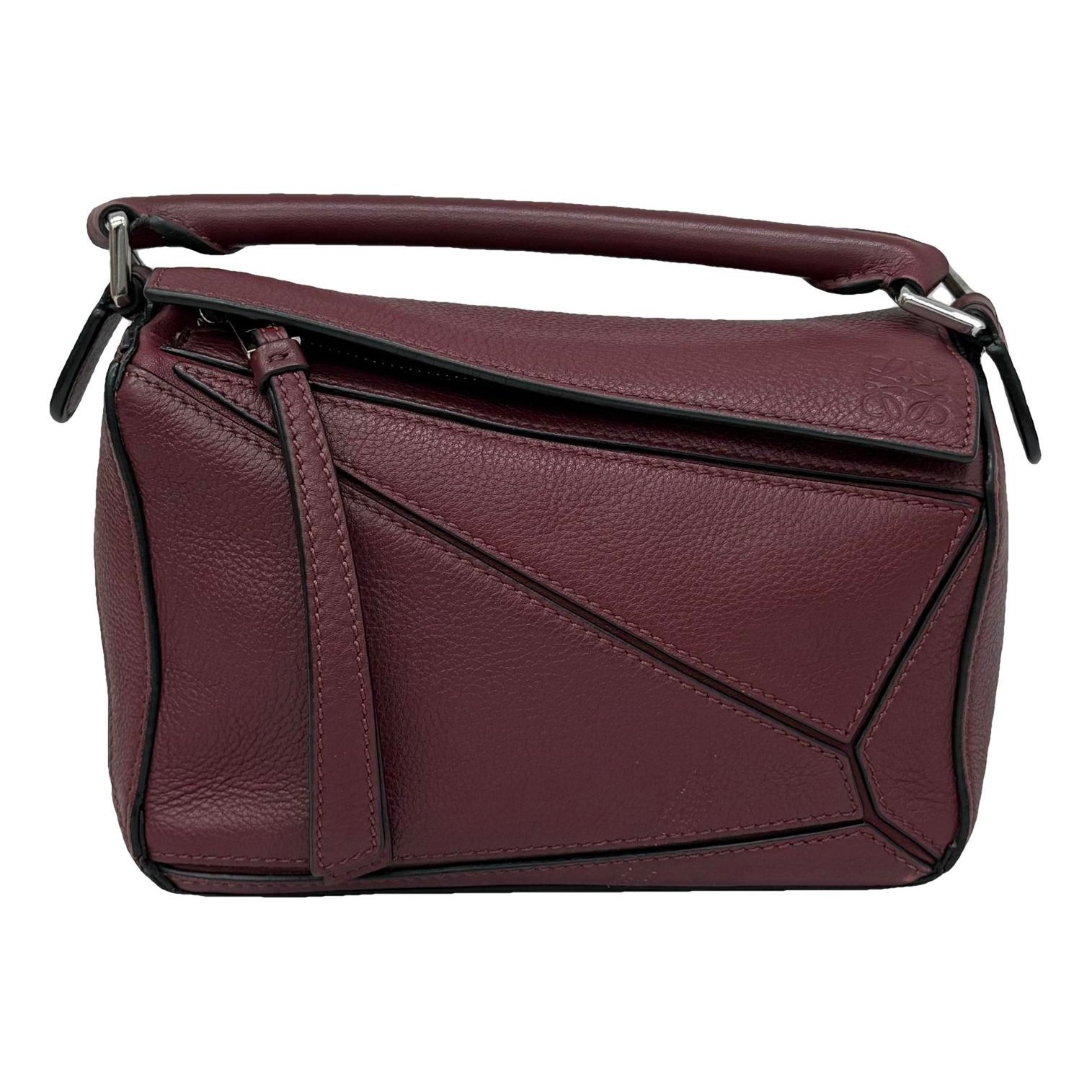 Puzzle leather handbag