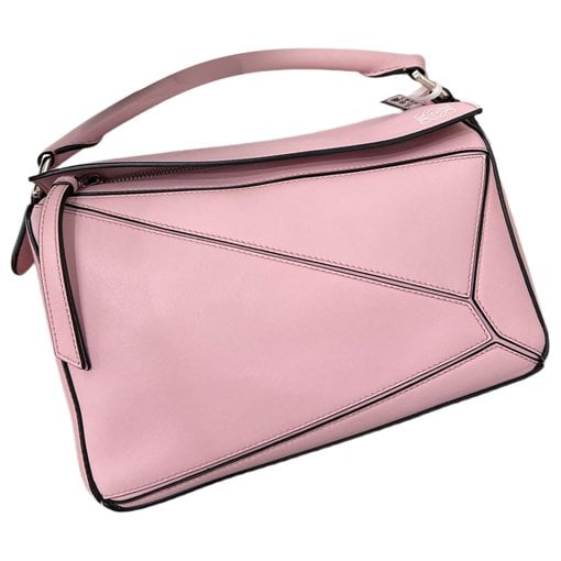 Puzzle leather handbag