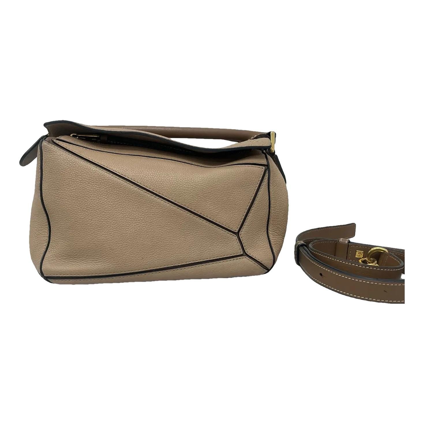 Puzzle leather crossbody bag
