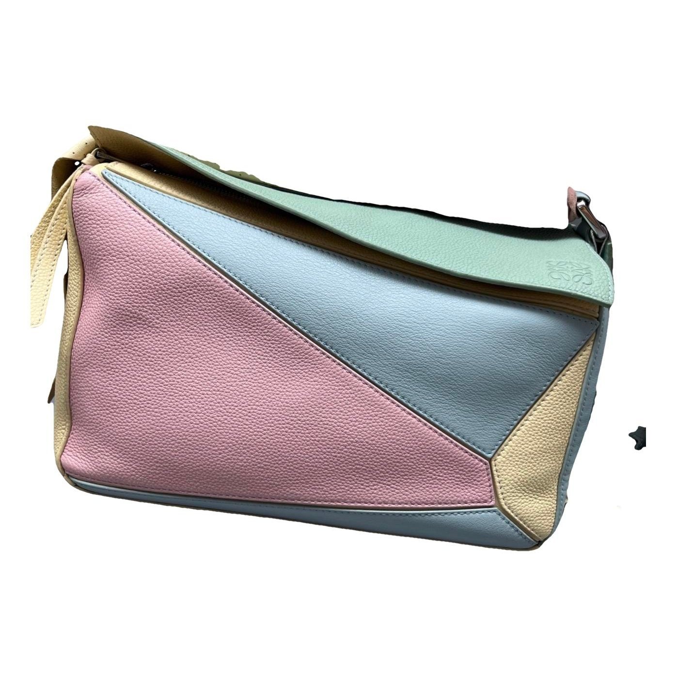 Puzzle leather handbag