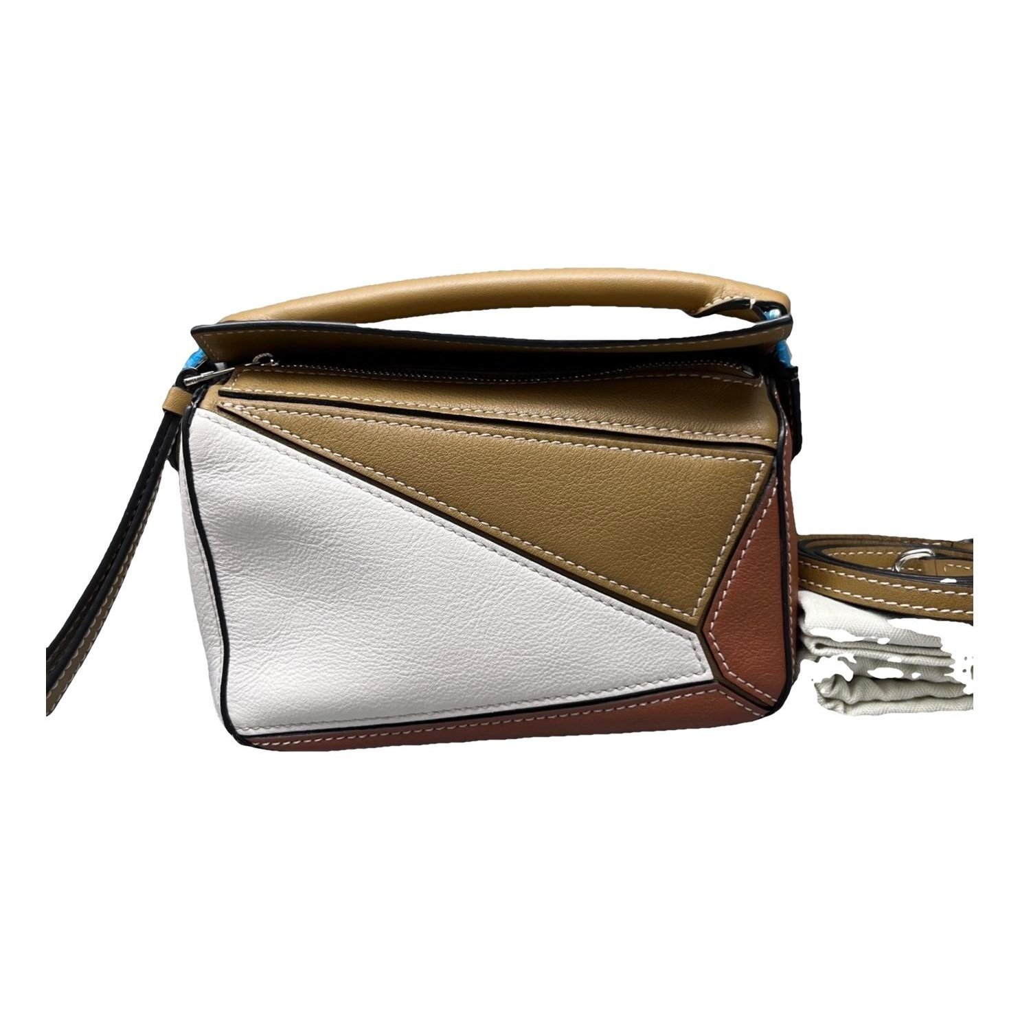 Puzzle leather handbag